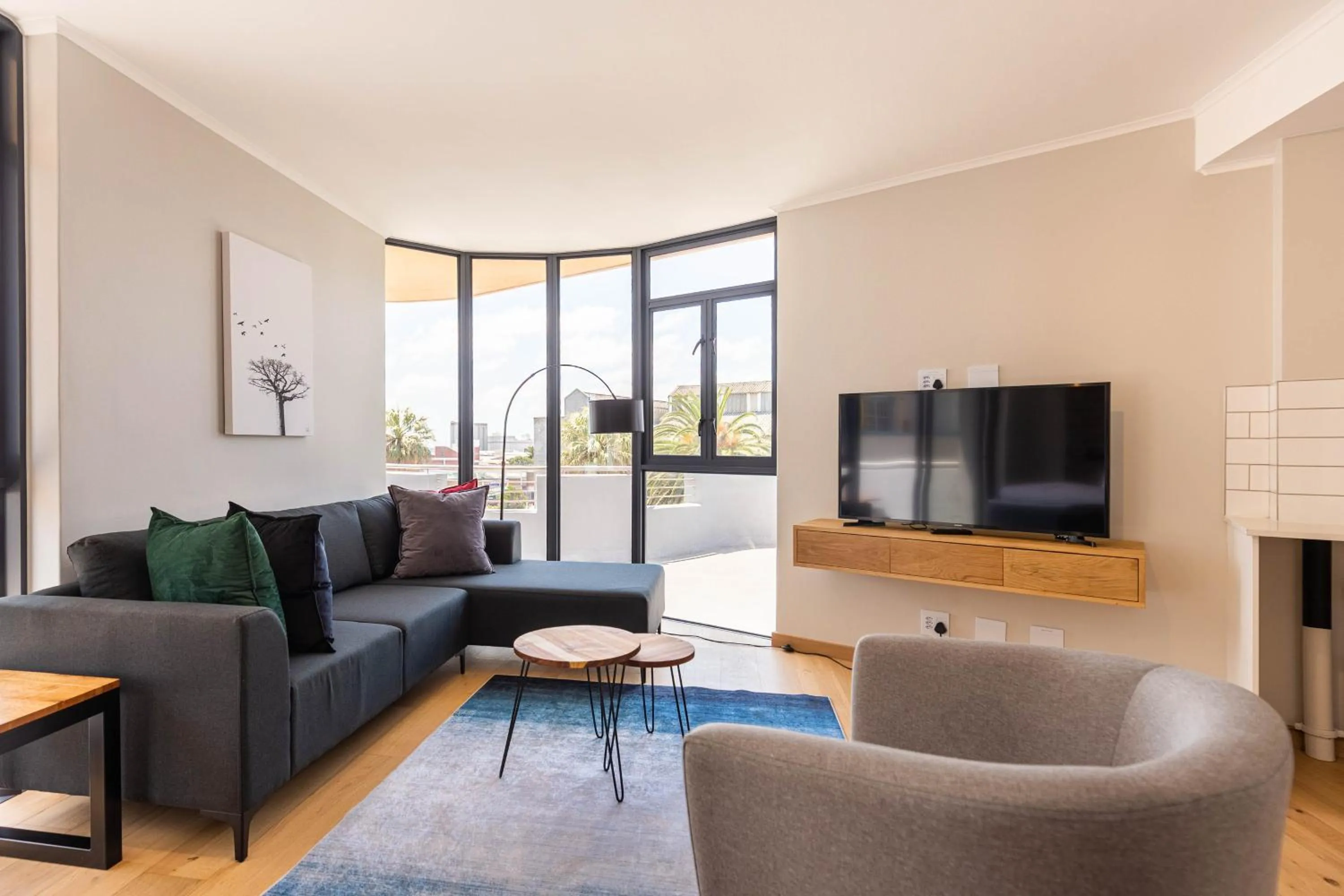 Living room in Urban Artisan Luxury Suites by Totalstay