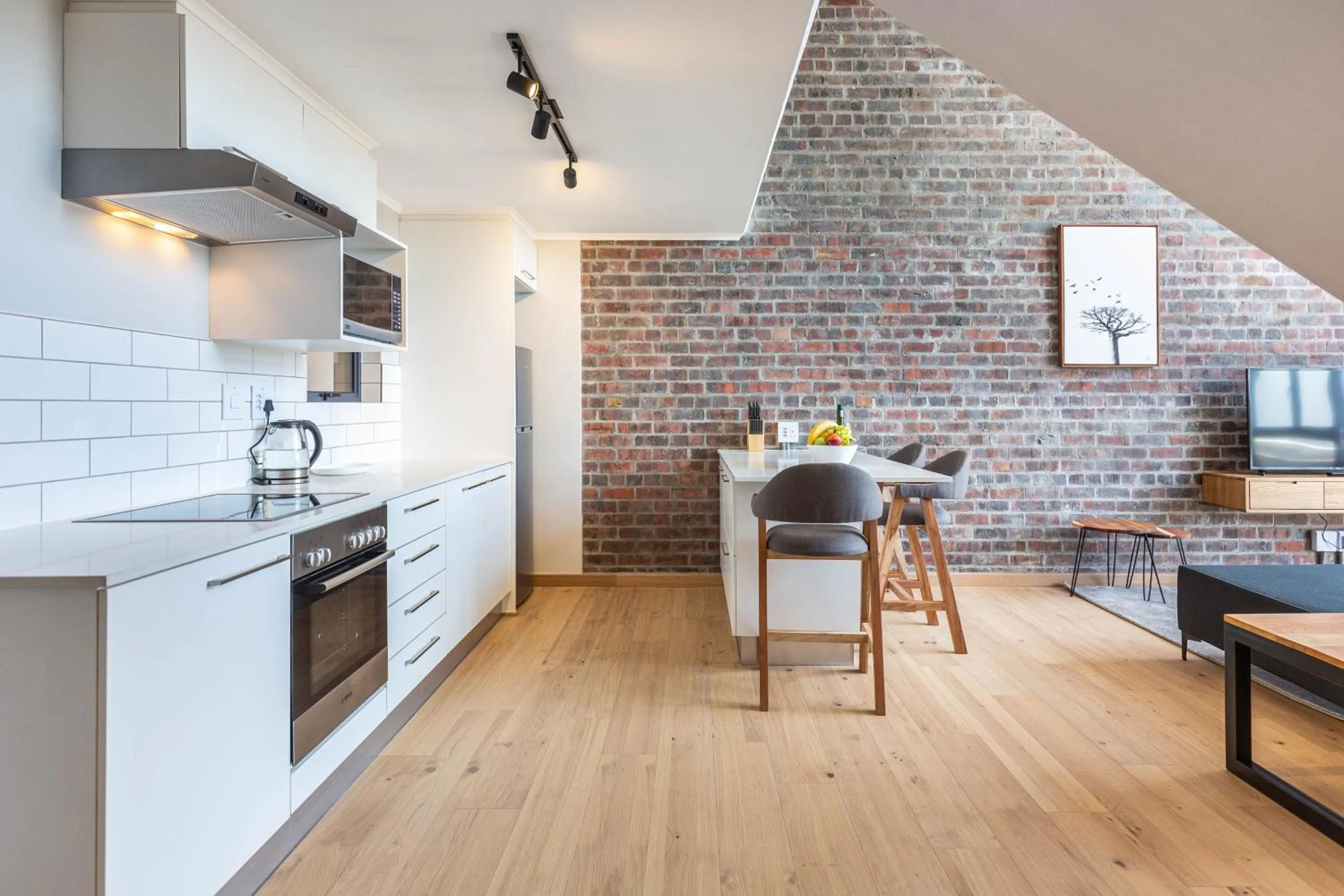 Kitchen or kitchenette in Urban Artisan Luxury Suites by Totalstay