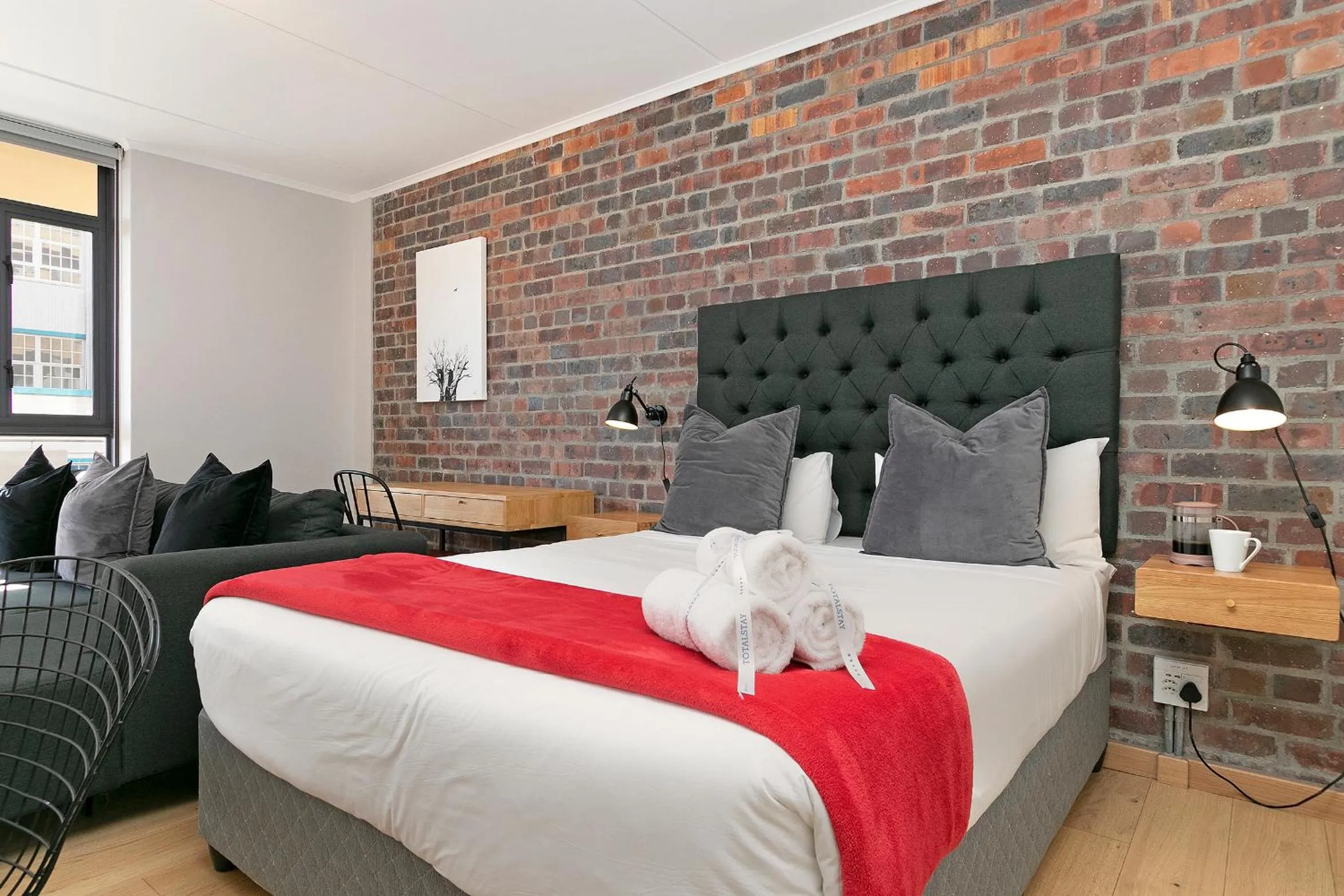 Photo of the whole room, Bed in Urban Artisan Luxury Suites by Totalstay