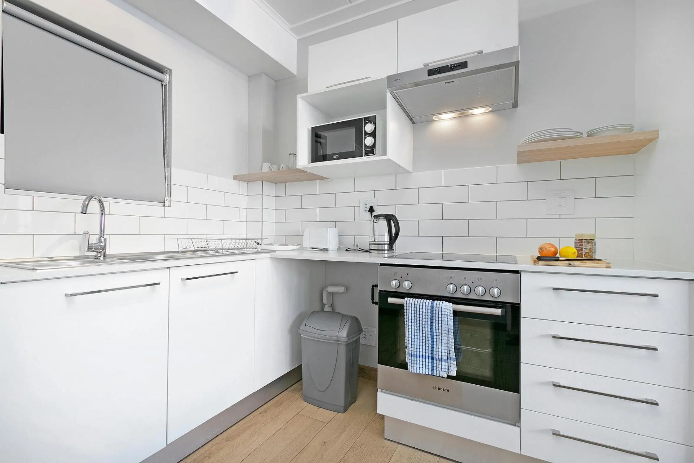 kitchen in Urban Artisan Luxury Suites by Totalstay