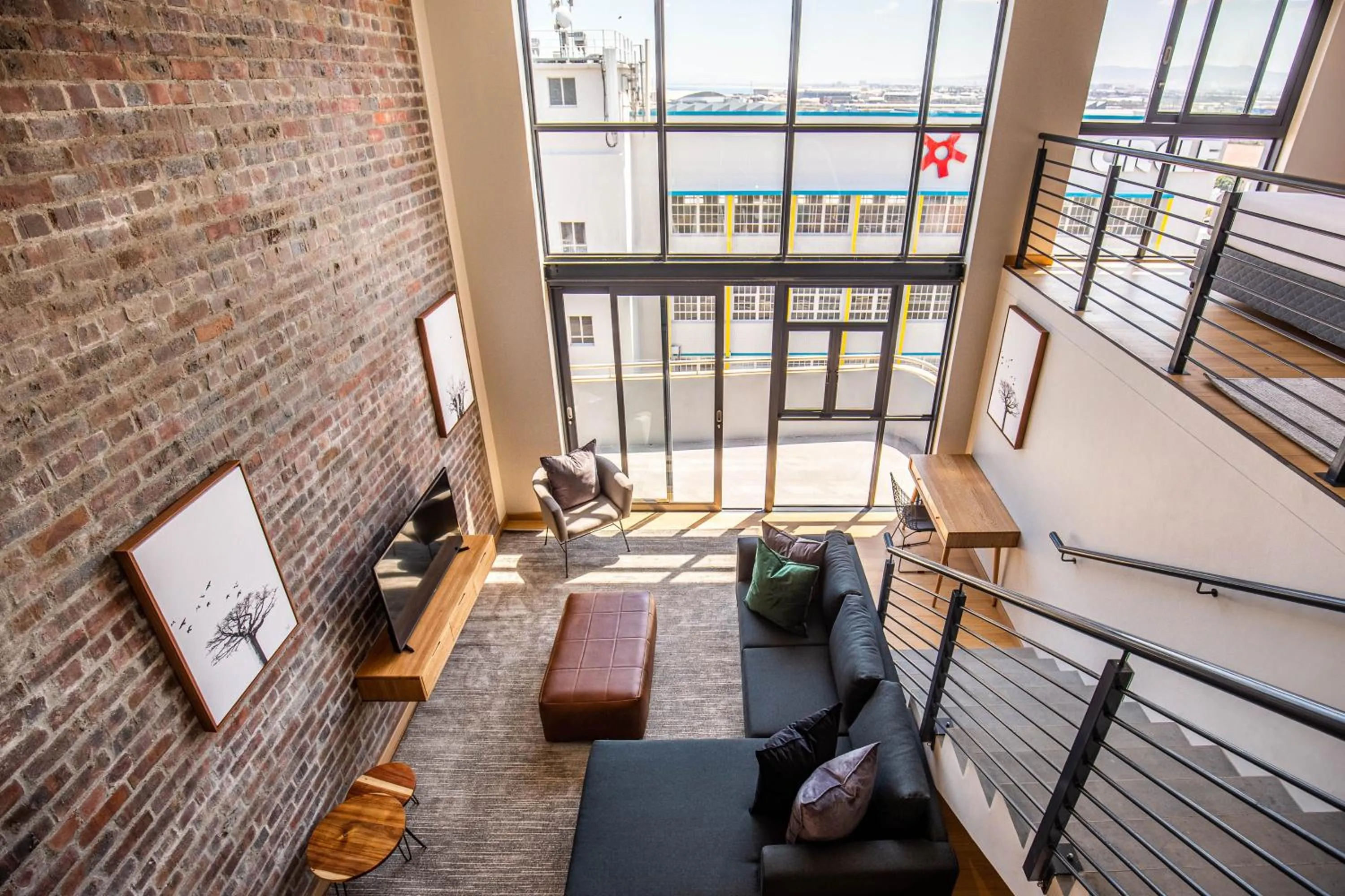 Living room in Urban Artisan Luxury Suites by Totalstay