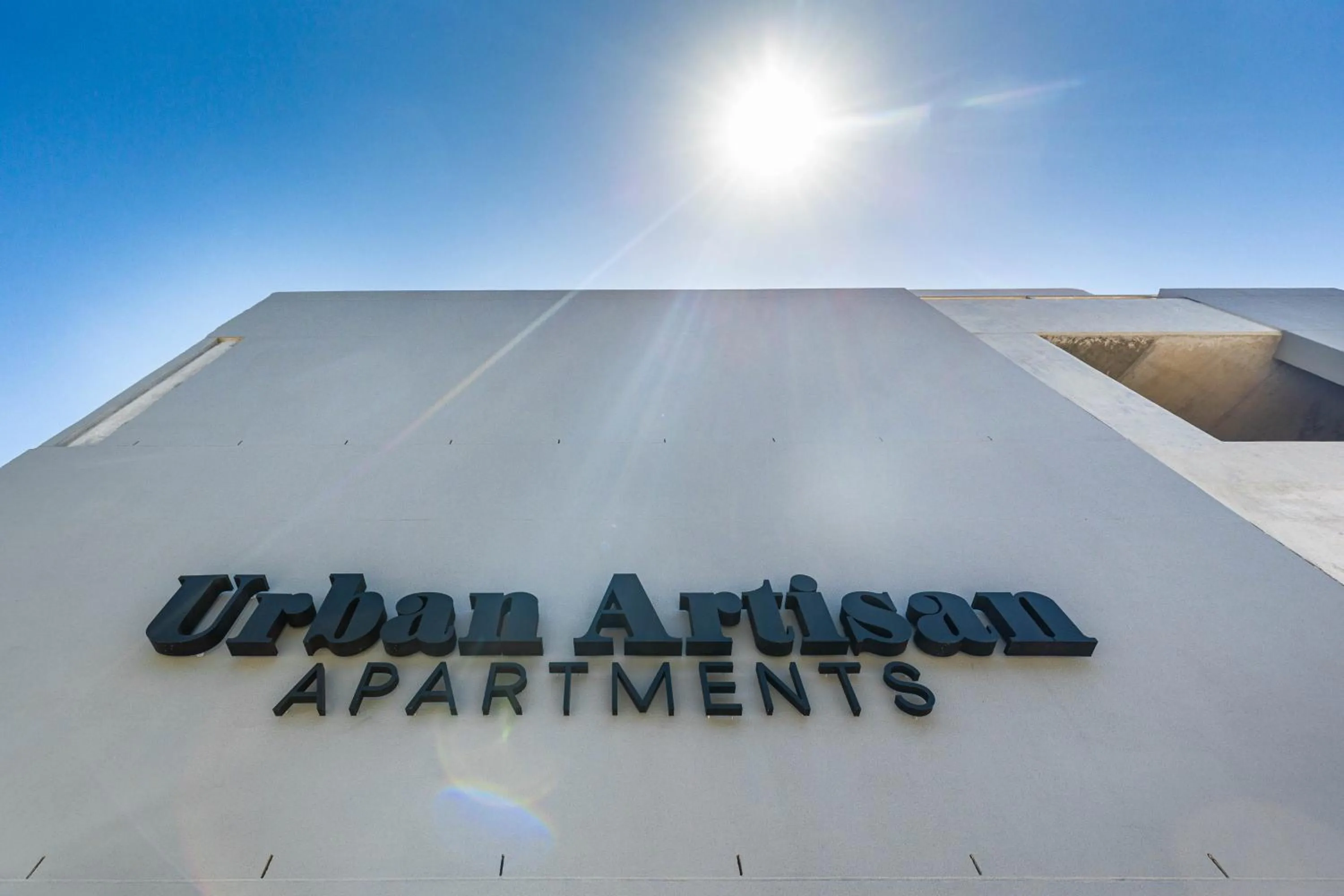 Property logo or sign in Urban Artisan Luxury Suites by Totalstay