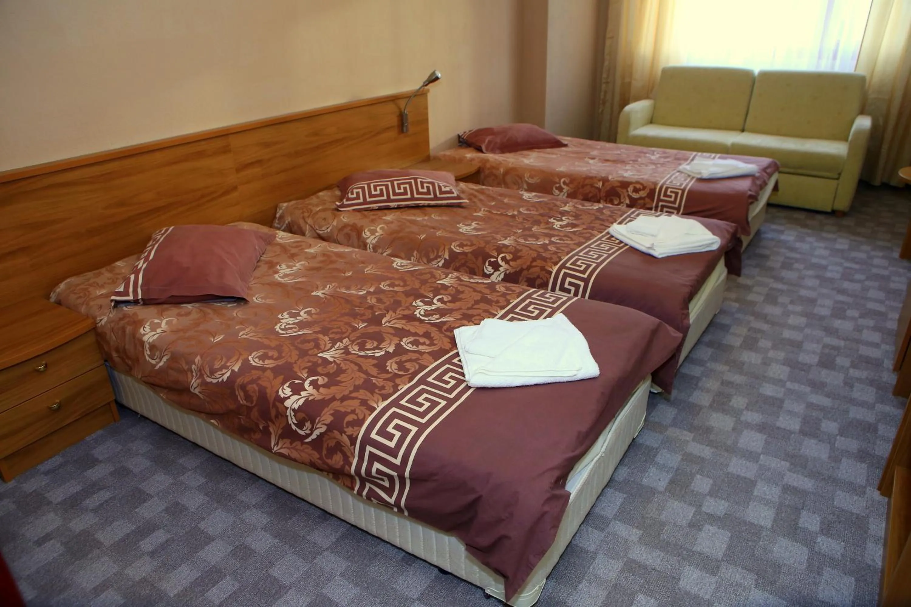 Shower, Bed in Family Prim Hotel