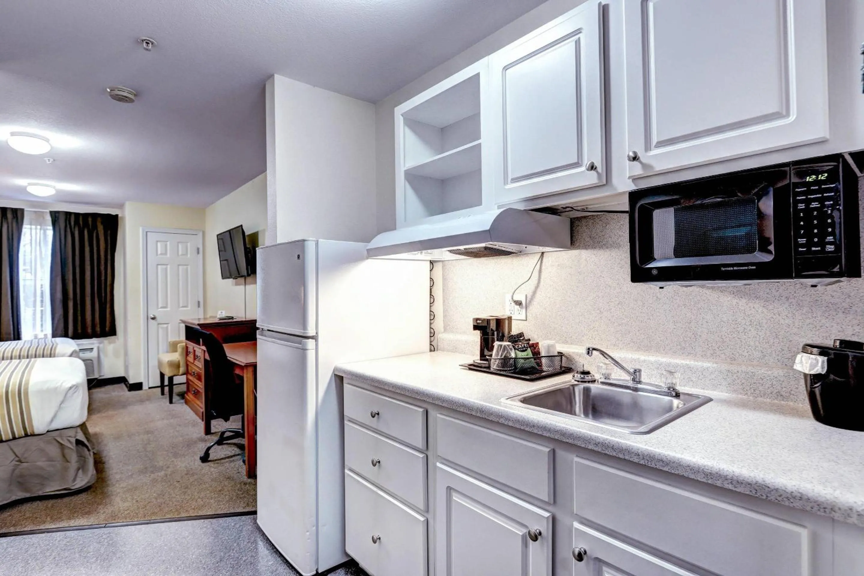 Bedroom in Suburban Studios Westminster Denver North