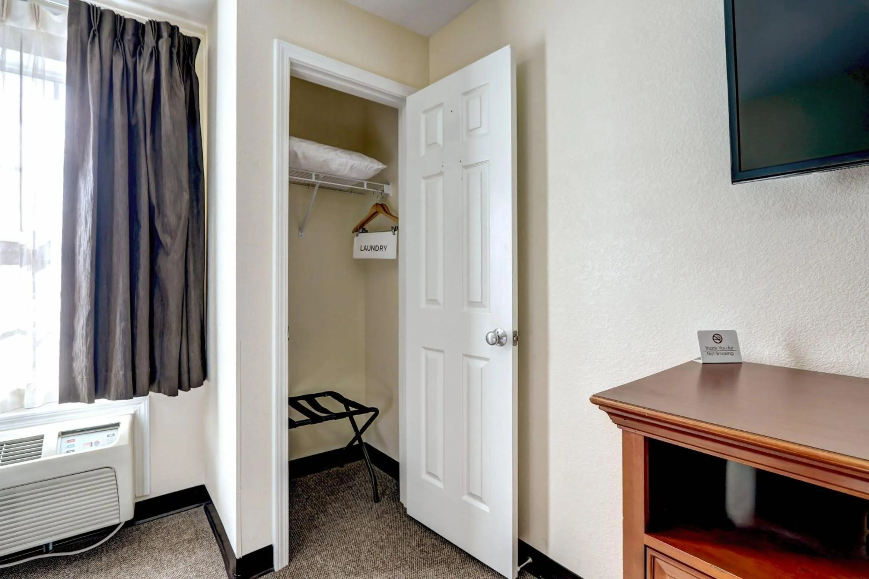 Bedroom in Suburban Studios Westminster Denver North