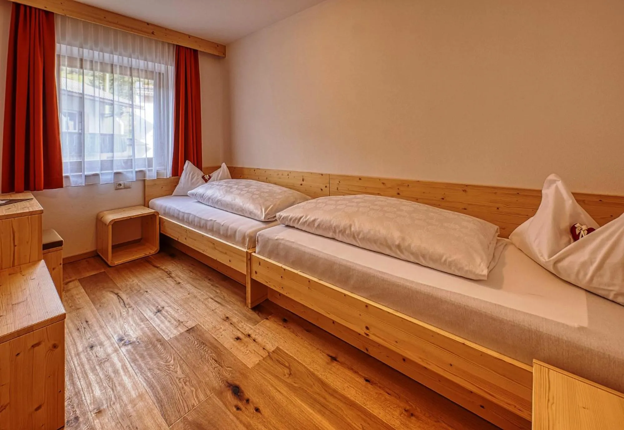 Bed in Garni Appartments Helvetia
