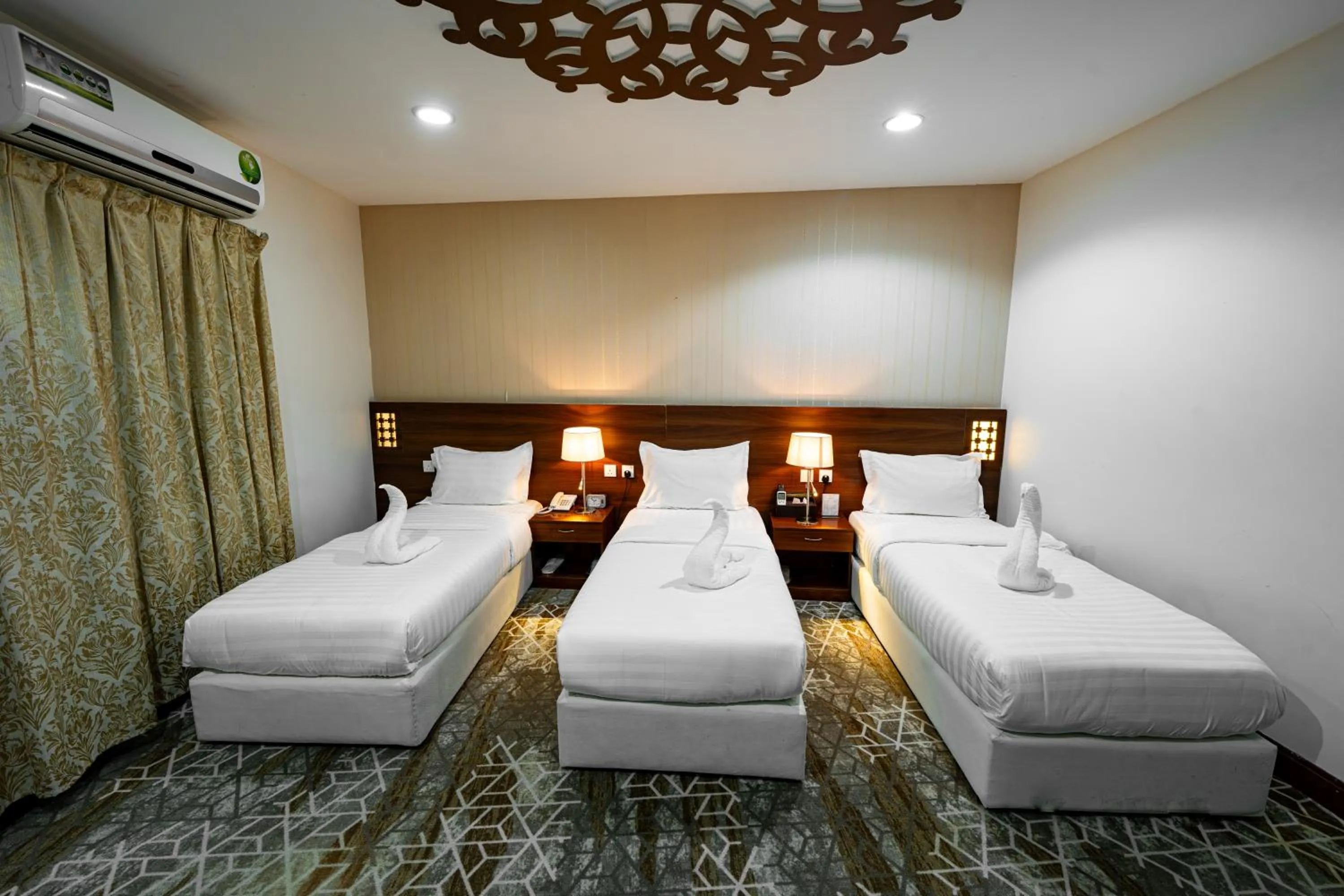 Photo of the whole room, Bed in Rizq Palace Hotel Makkah