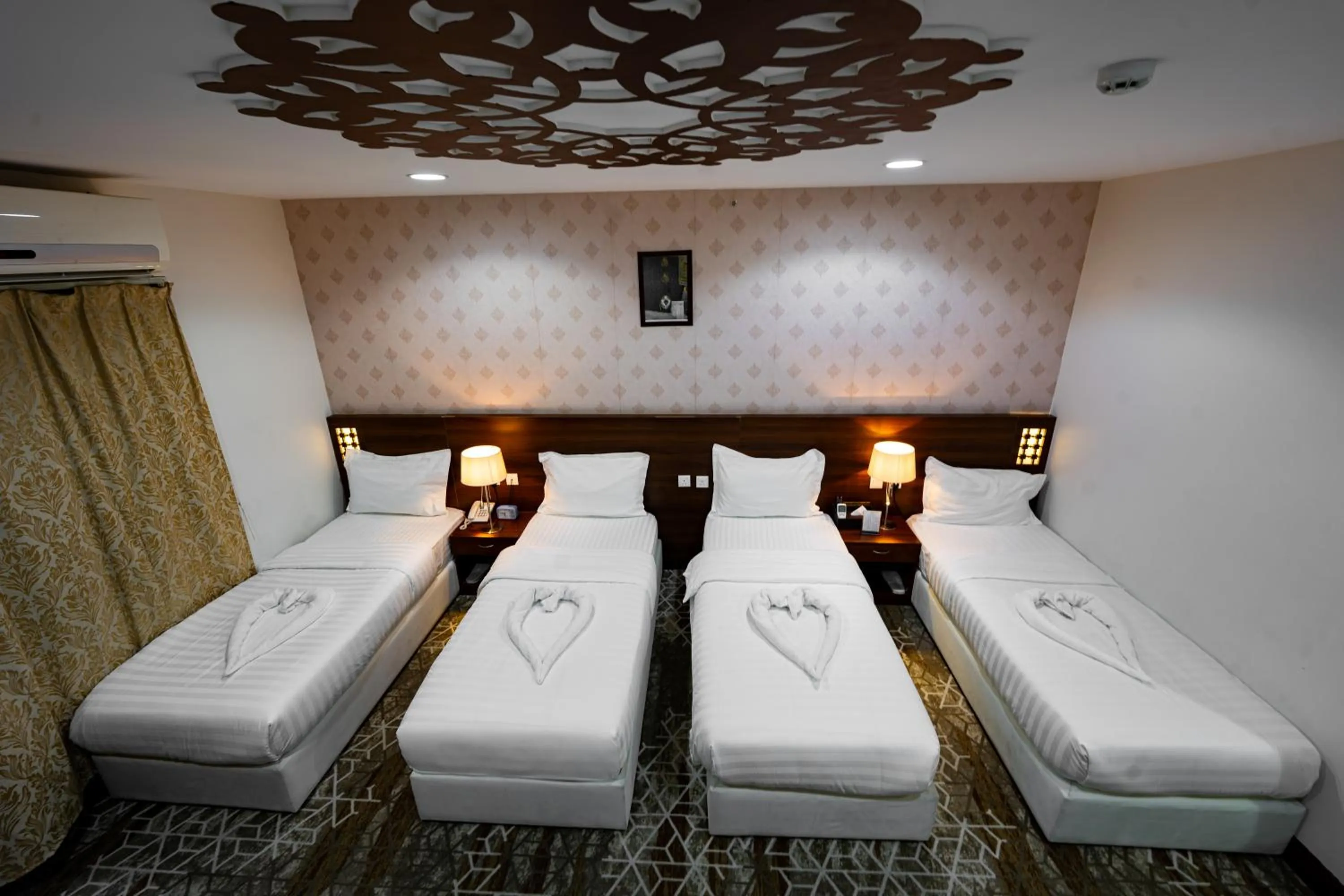 Bed in Rizq Palace Hotel Makkah