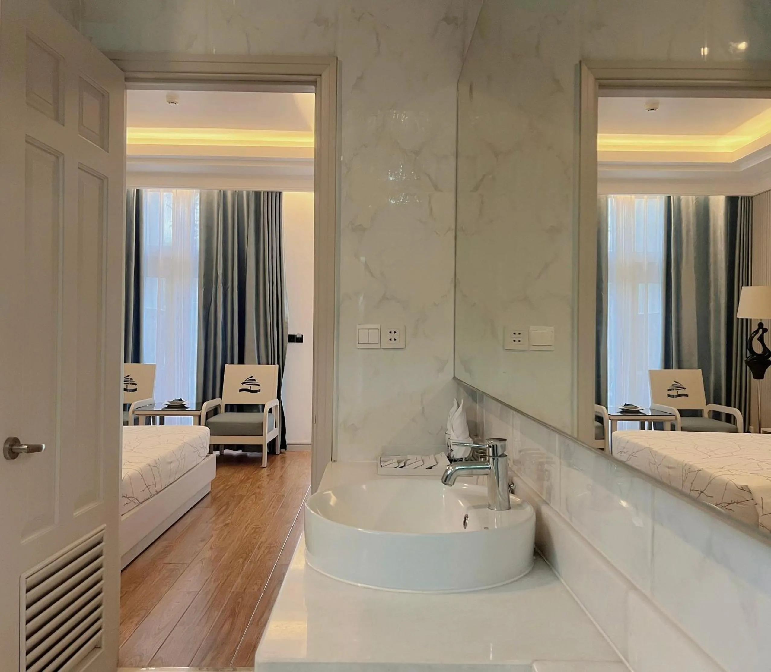 Bathroom, Bed in Carmelina Beach Resort Ho Tram