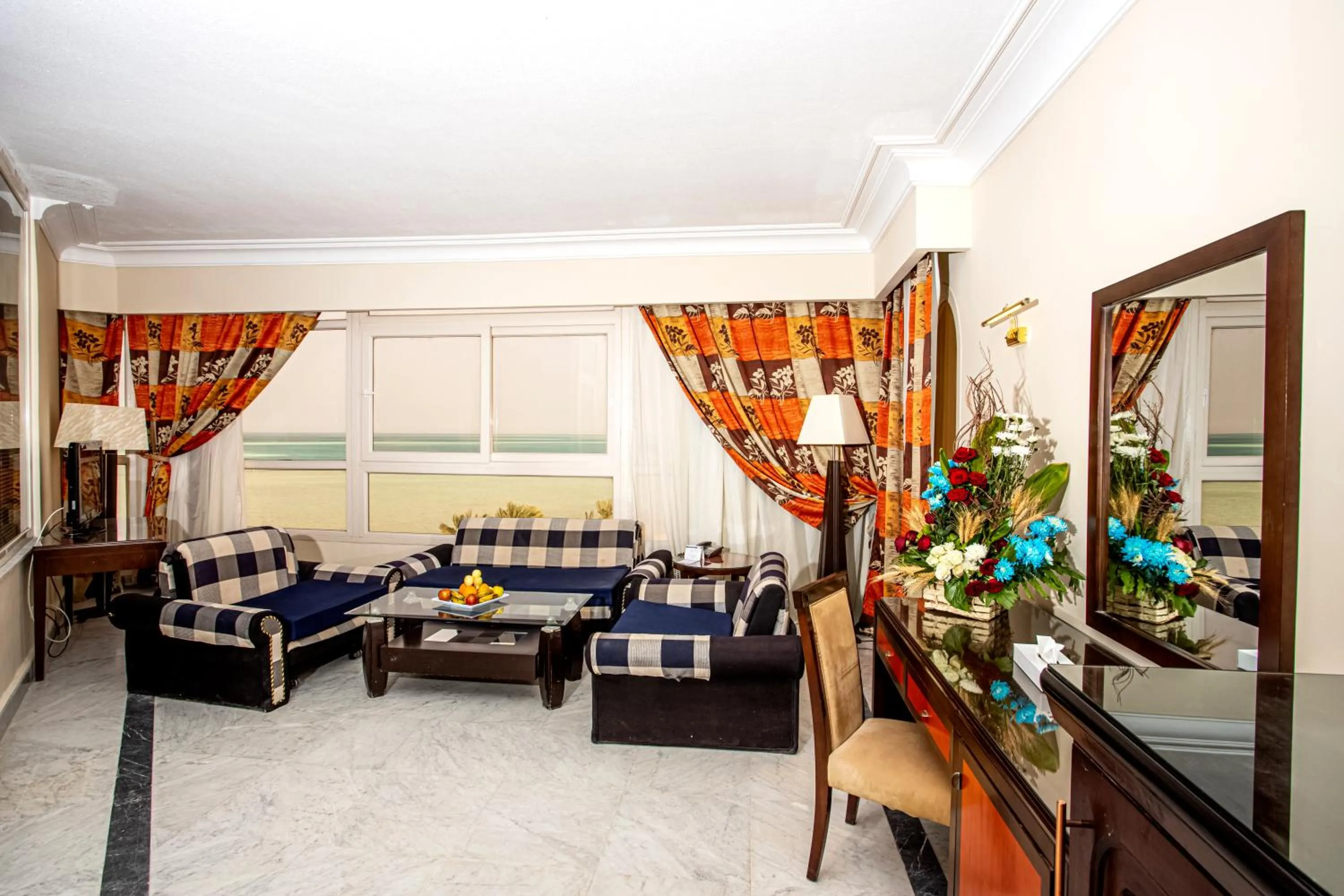 Living room in AMC Royal Hotel & Spa