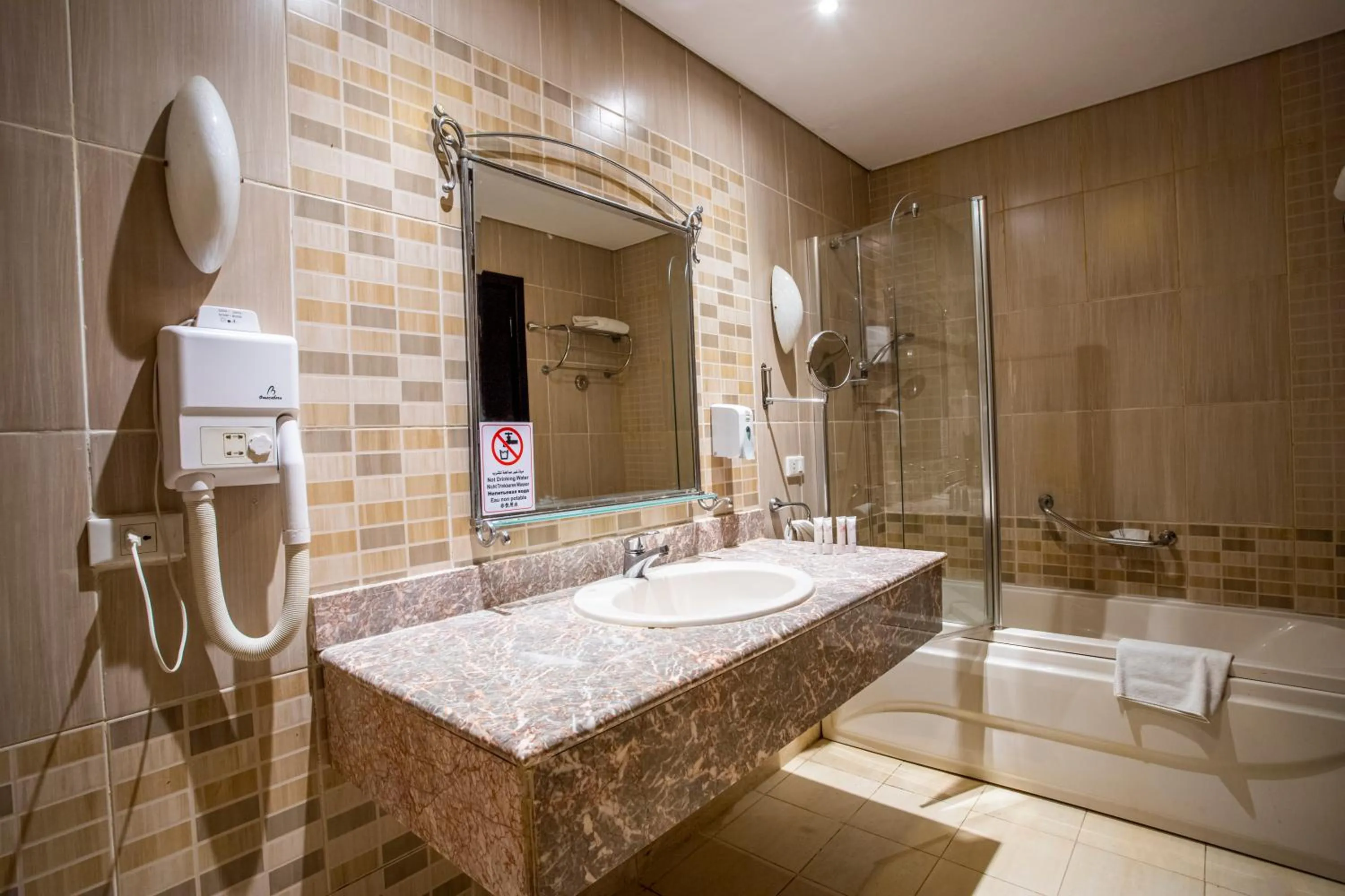 Bathroom in AMC Royal Hotel & Spa