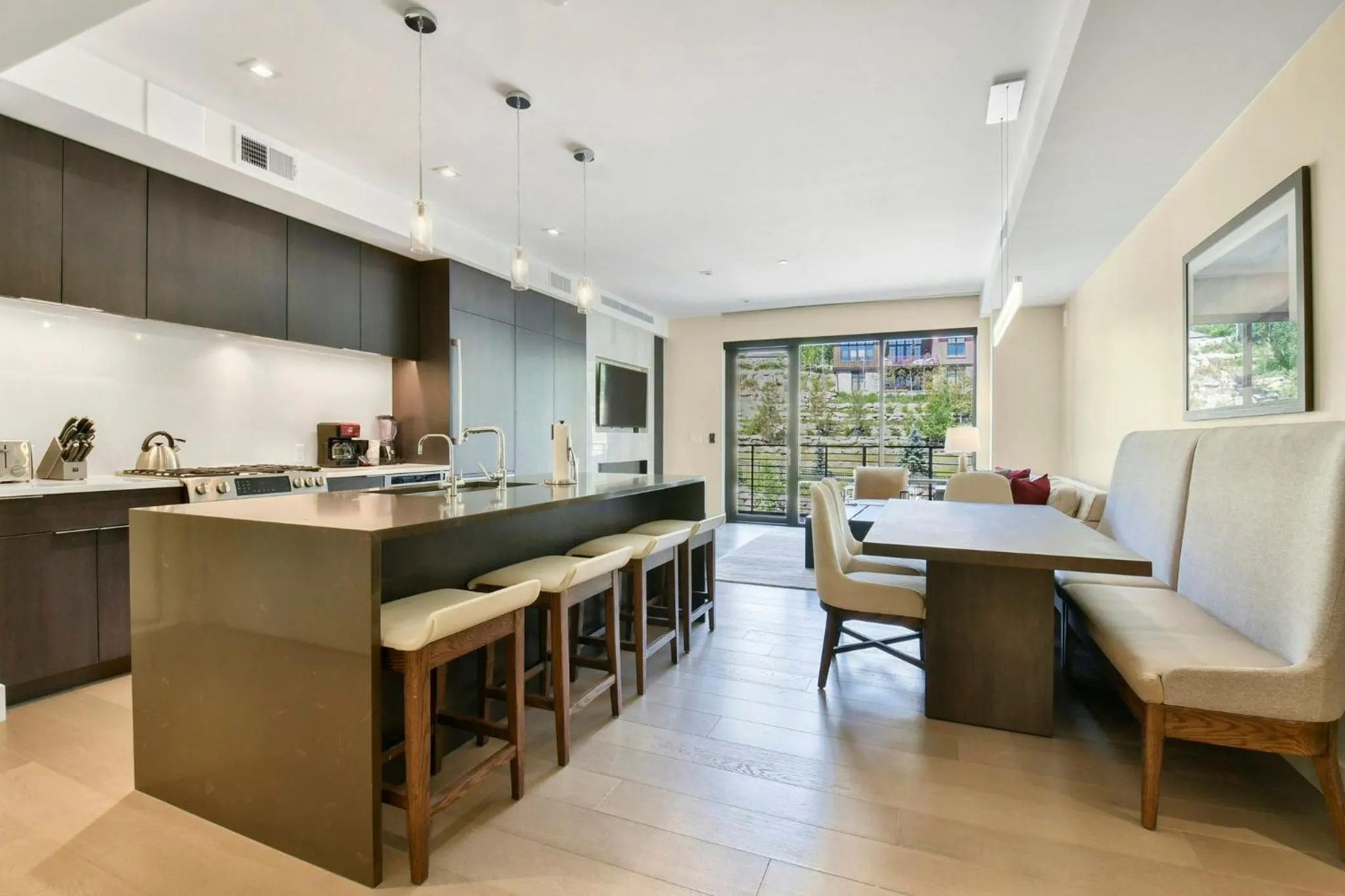 Communal kitchen in Lift Park City Condominiums by Vail Resorts