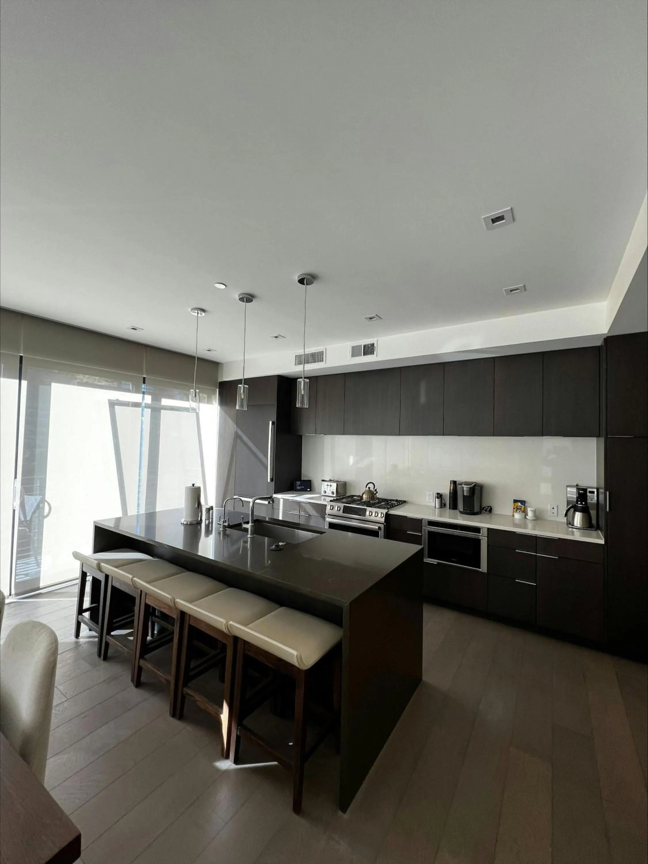 Communal kitchen in Lift Park City Condominiums by Vail Resorts