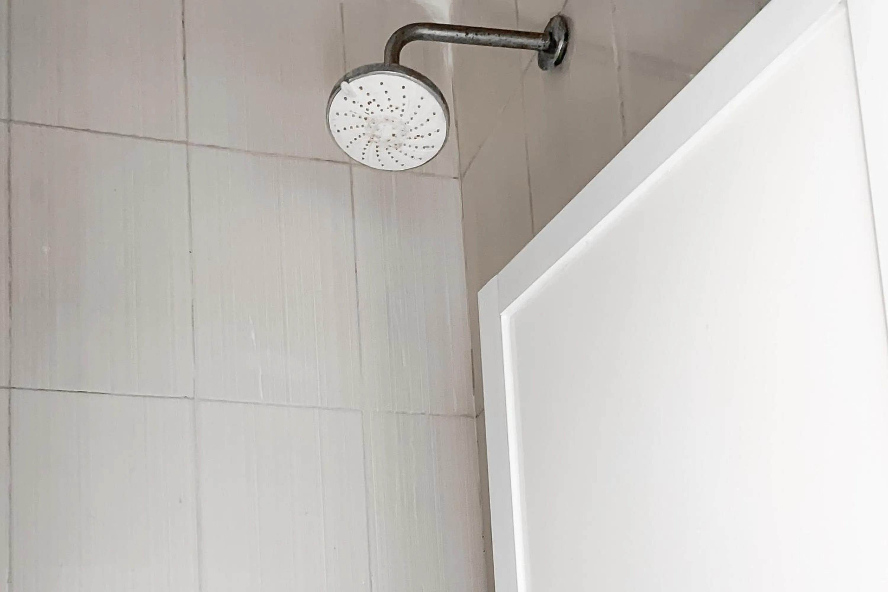 Bathroom in Karins Guesthouse Syariah RedPartner