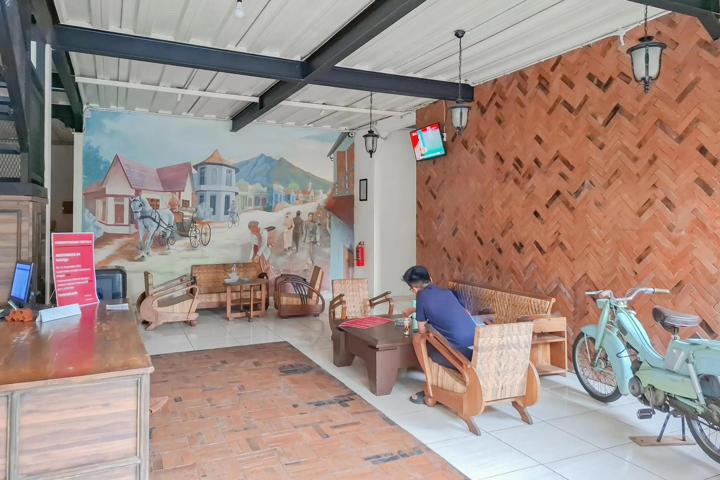 Seating area in SUPER OYO Collection O 2383 Andongkoe 64 Salatiga