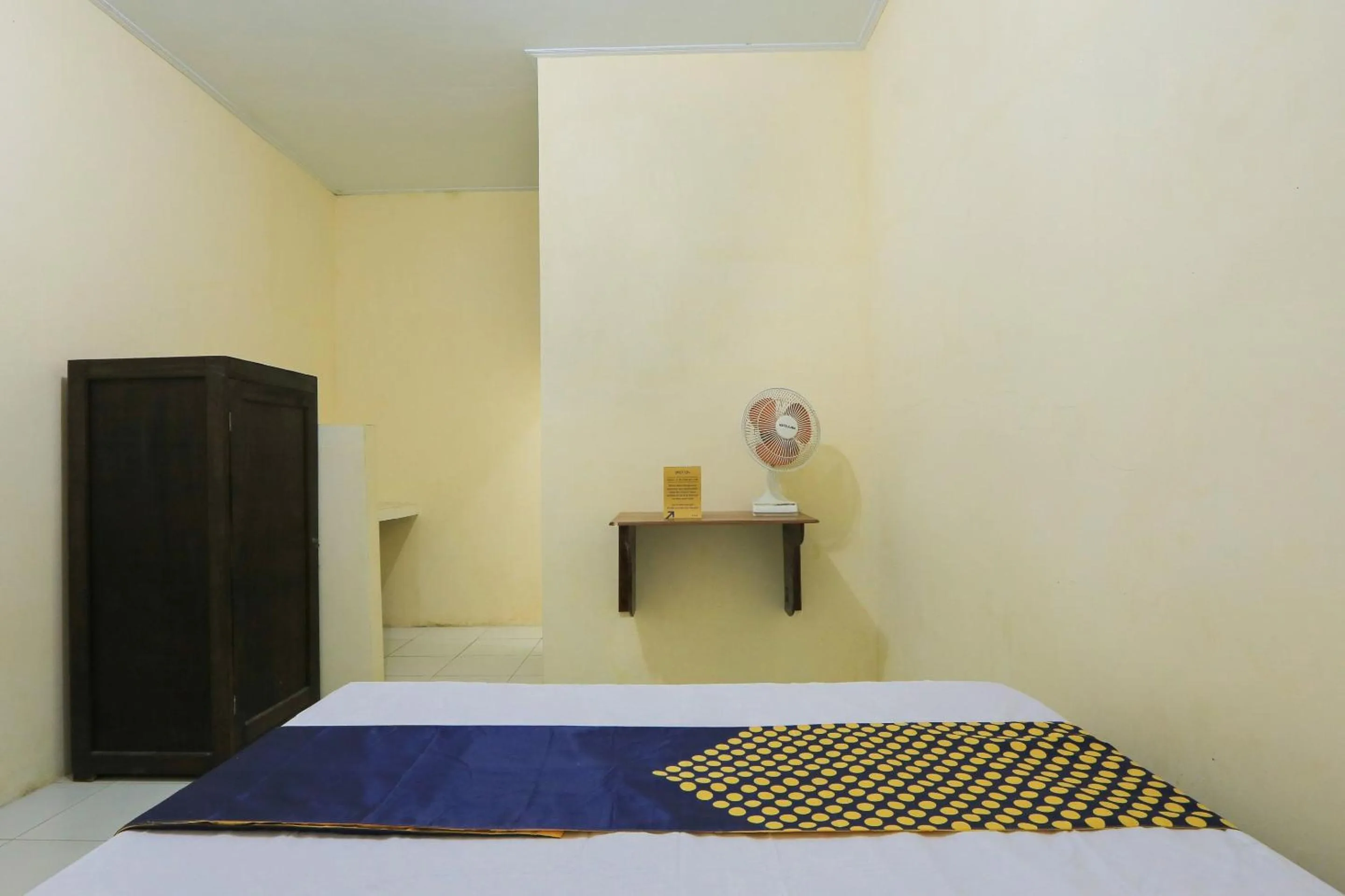 Bedroom, Bed in OYO 2371 Islami Family Residence