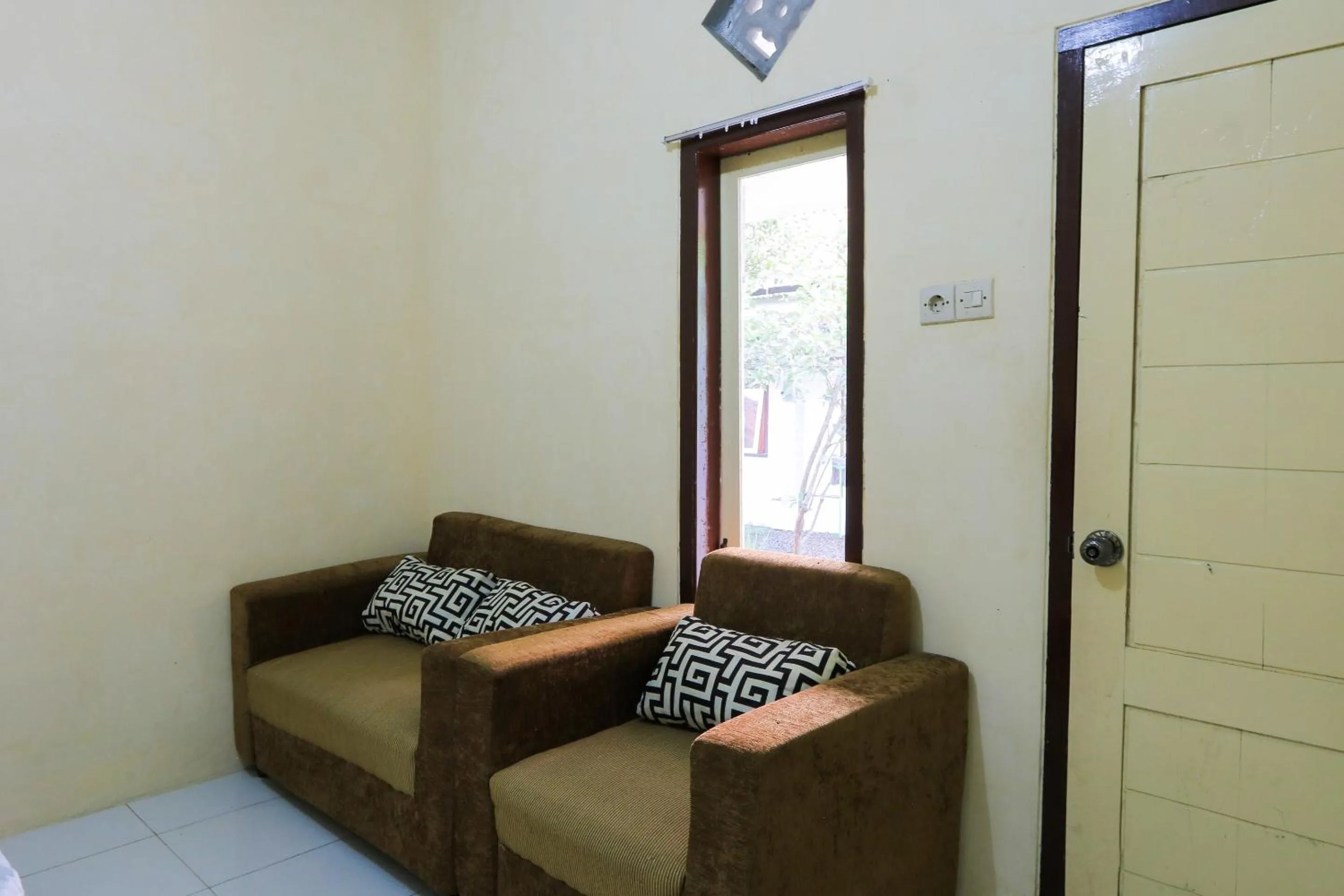 Bedroom in OYO 2371 Islami Family Residence