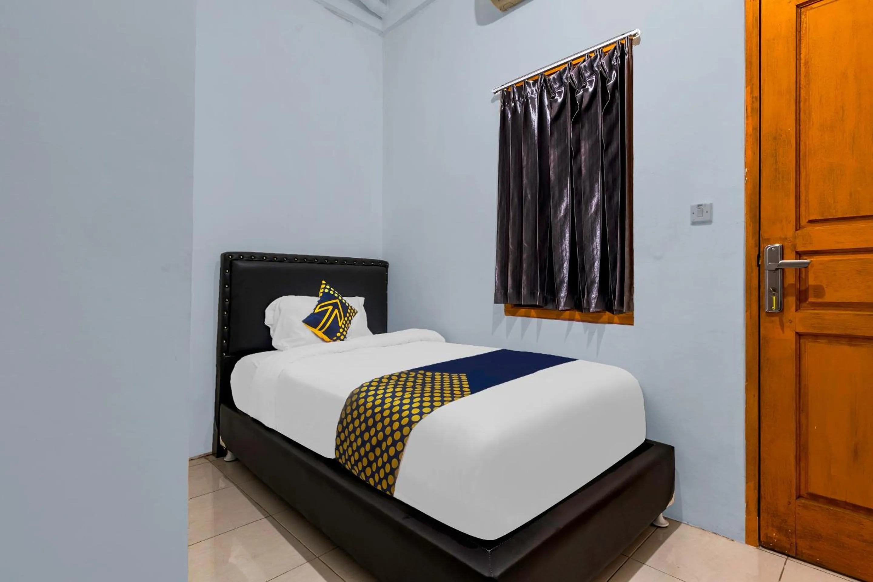 Bedroom, Bed in OYO Life 2412 Mandala Residence