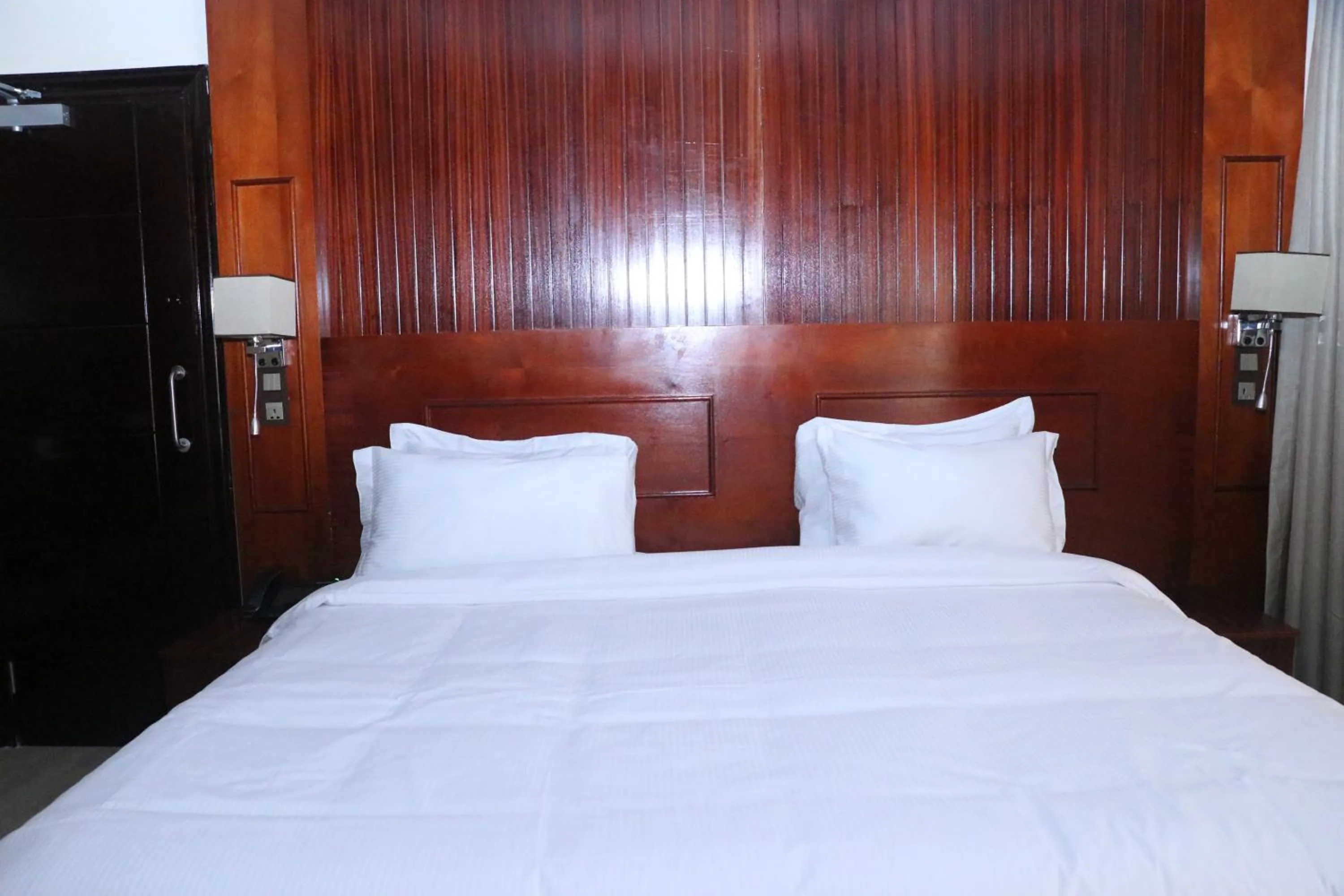 Bed in Sainte Famille Hotel