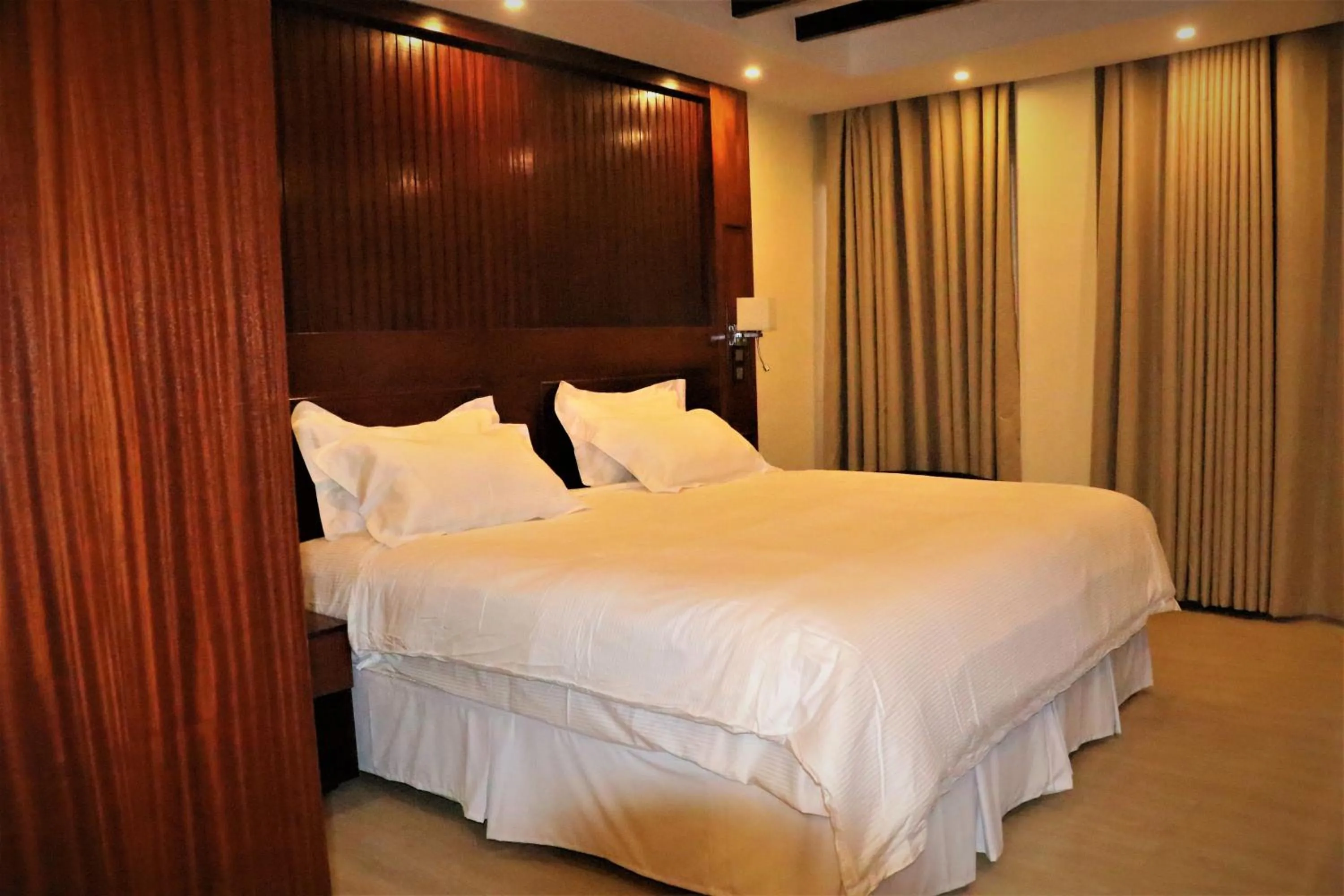 Living room, Bed in Sainte Famille Hotel