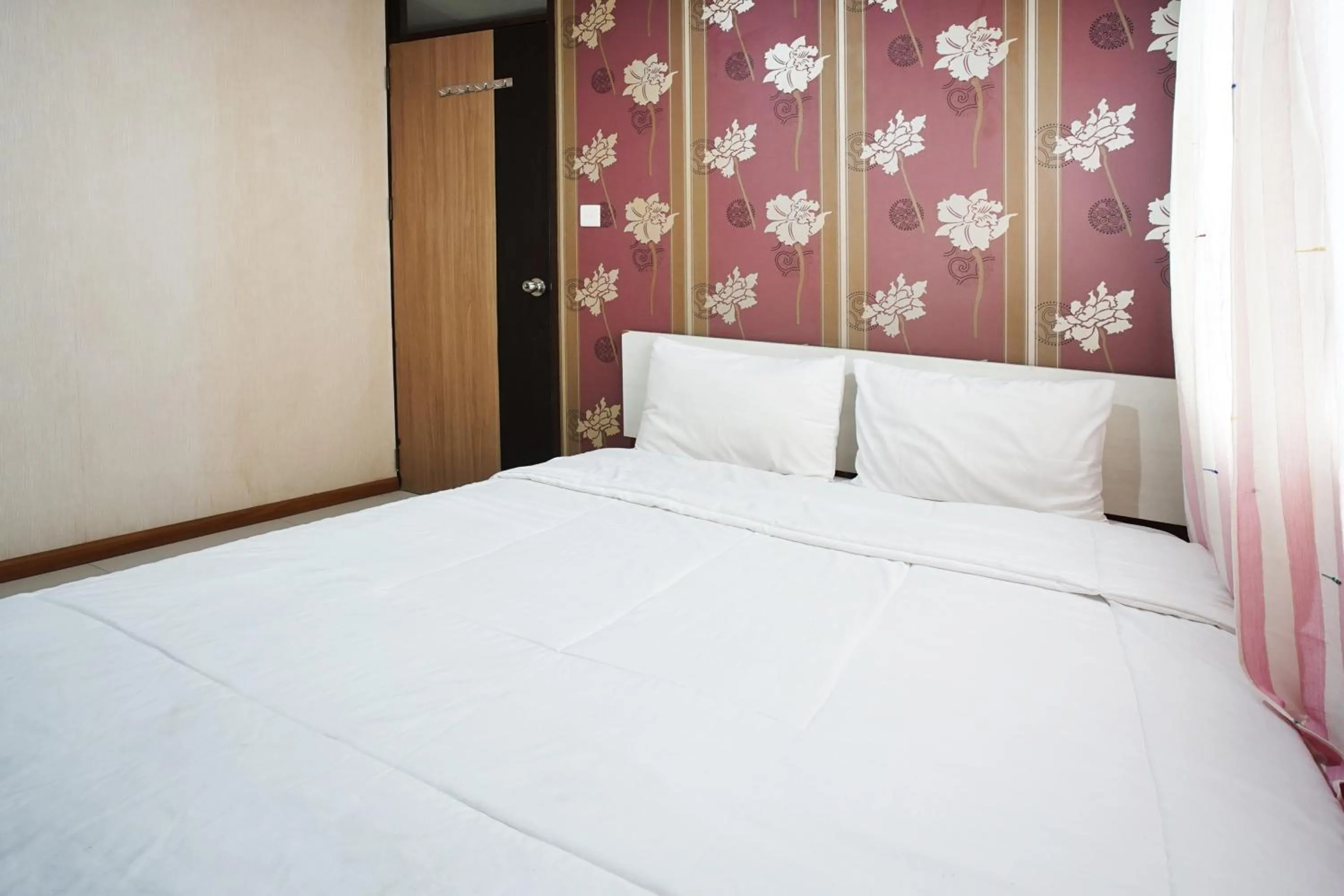 Bed in Kamarku Apartment at The Edge