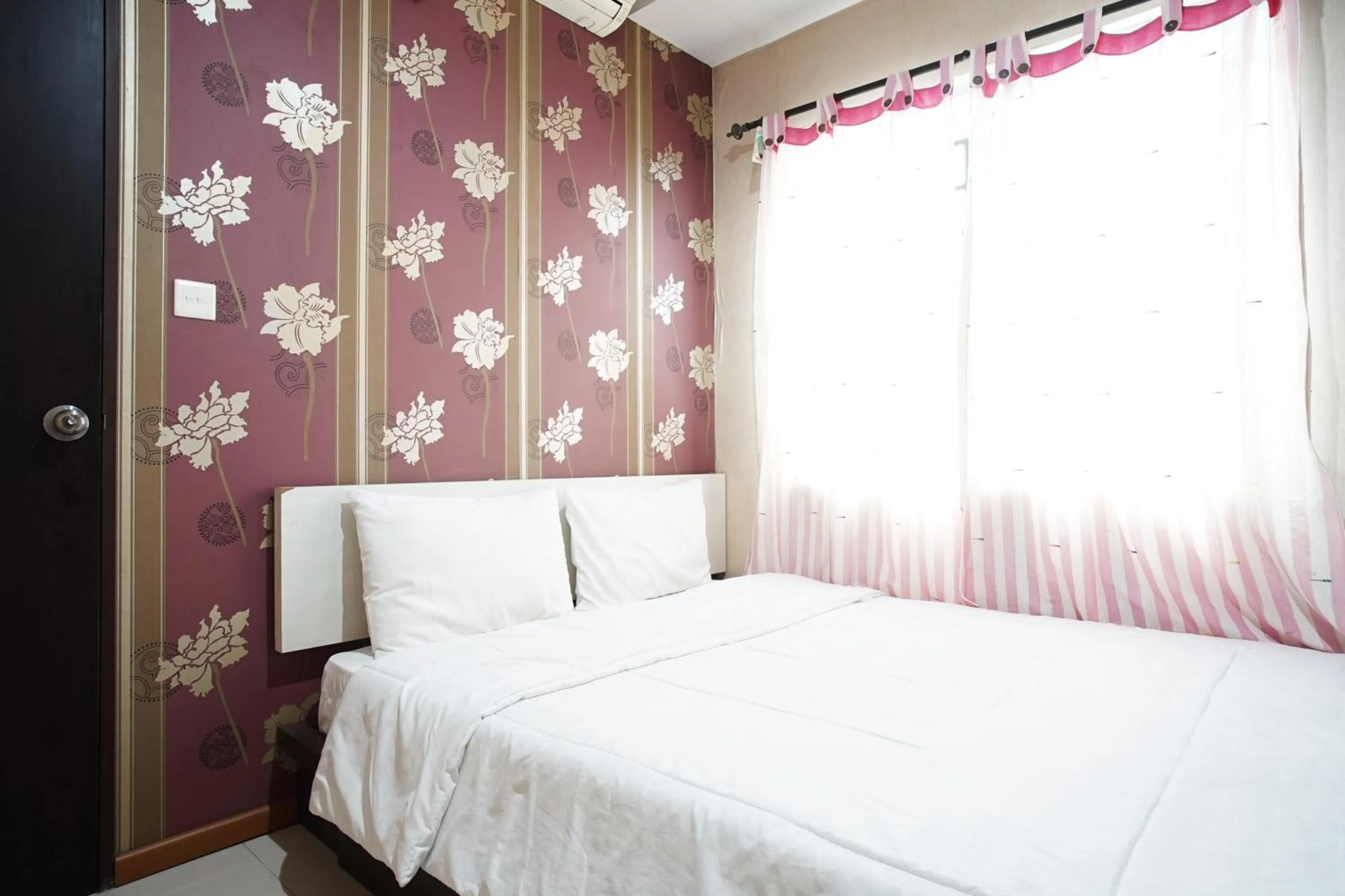 Bed in Kamarku Apartment at The Edge