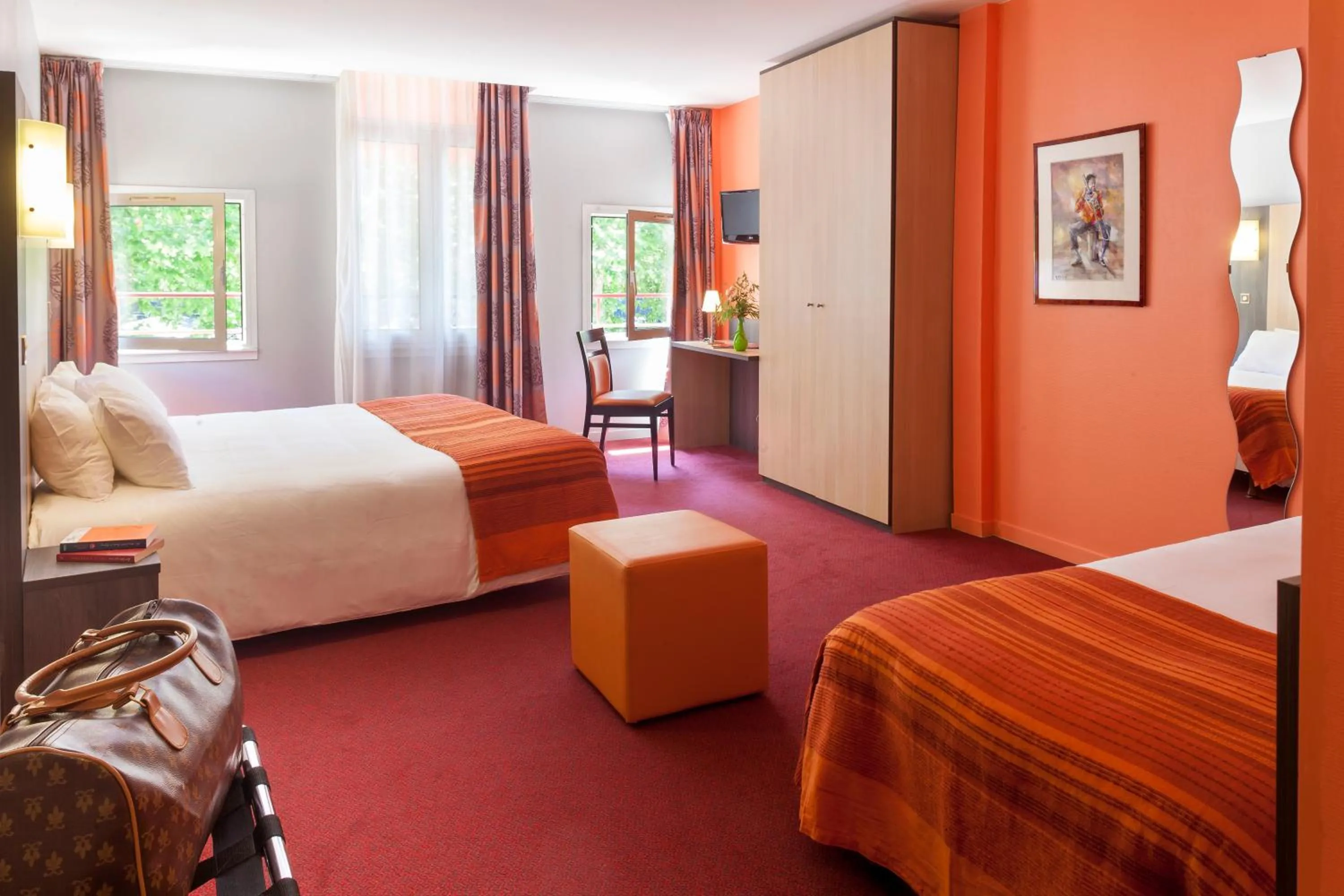 Photo of the whole room, Bed in BRIT HOTEL Le Lion d'Or CHINON