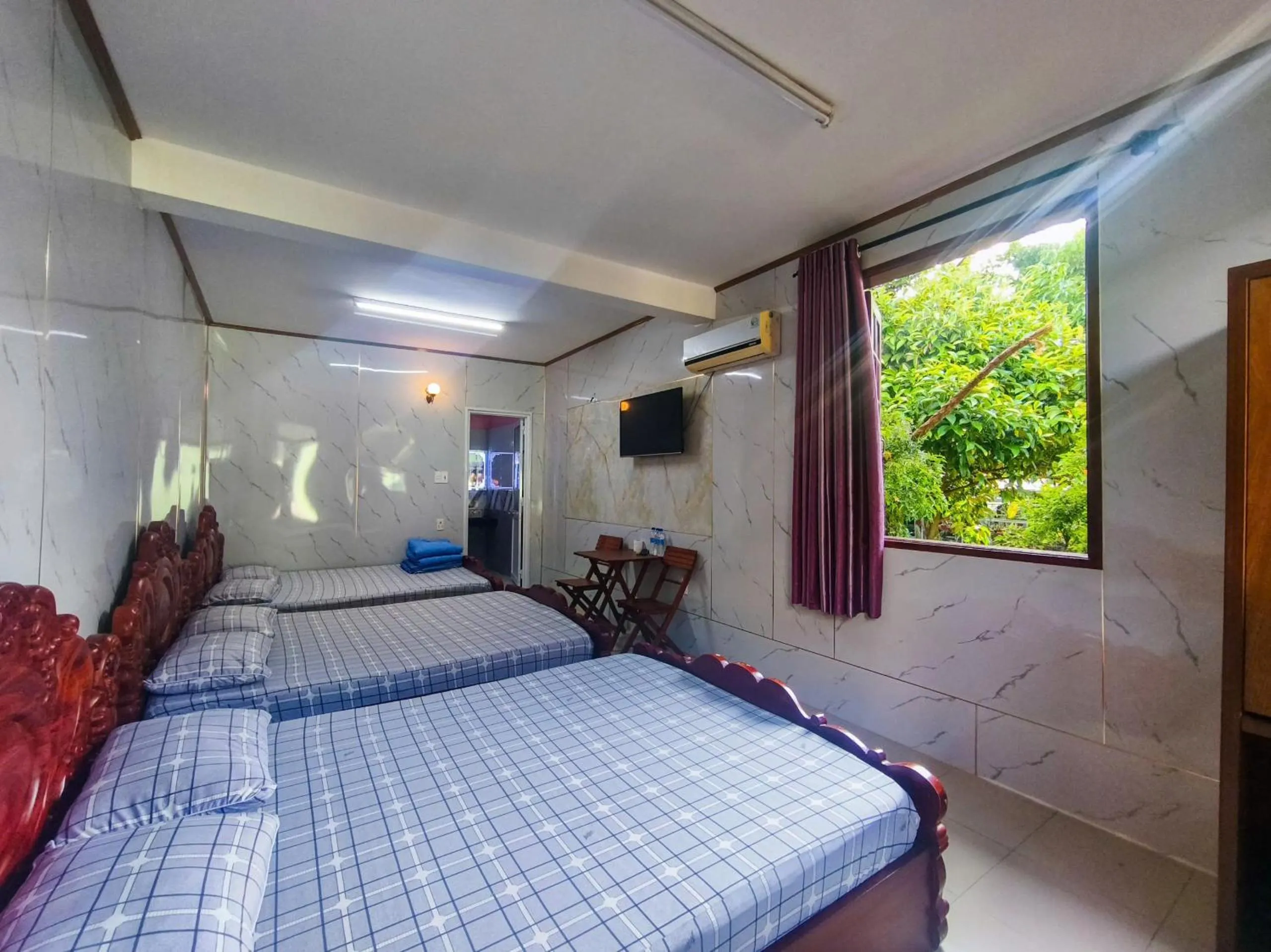 Bed in Nhà Nghỉ THẢO NGUYÊN XANH