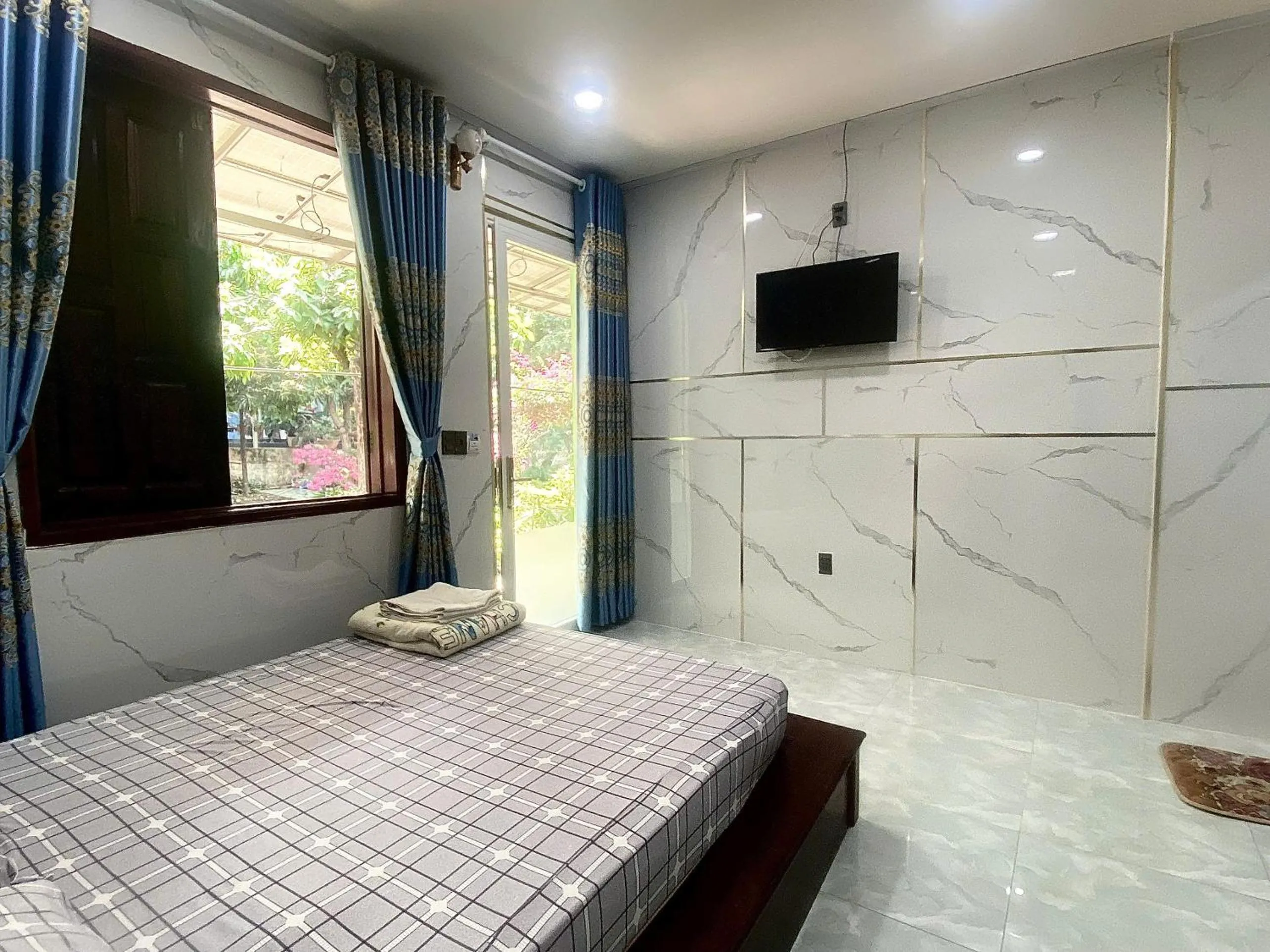 Bed in Nhà Nghỉ THẢO NGUYÊN XANH