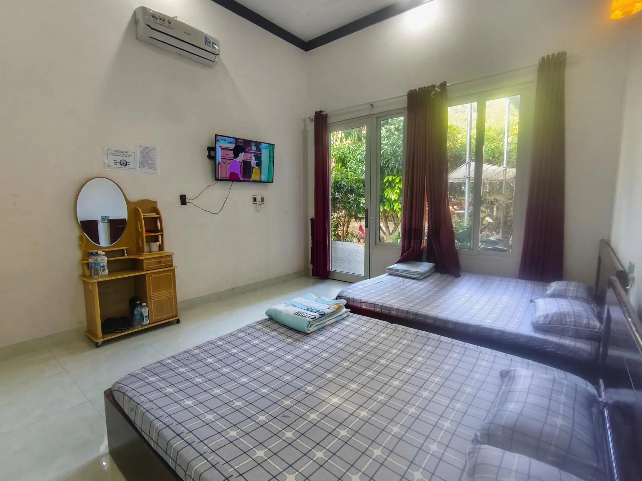 Bed in Nhà Nghỉ THẢO NGUYÊN XANH