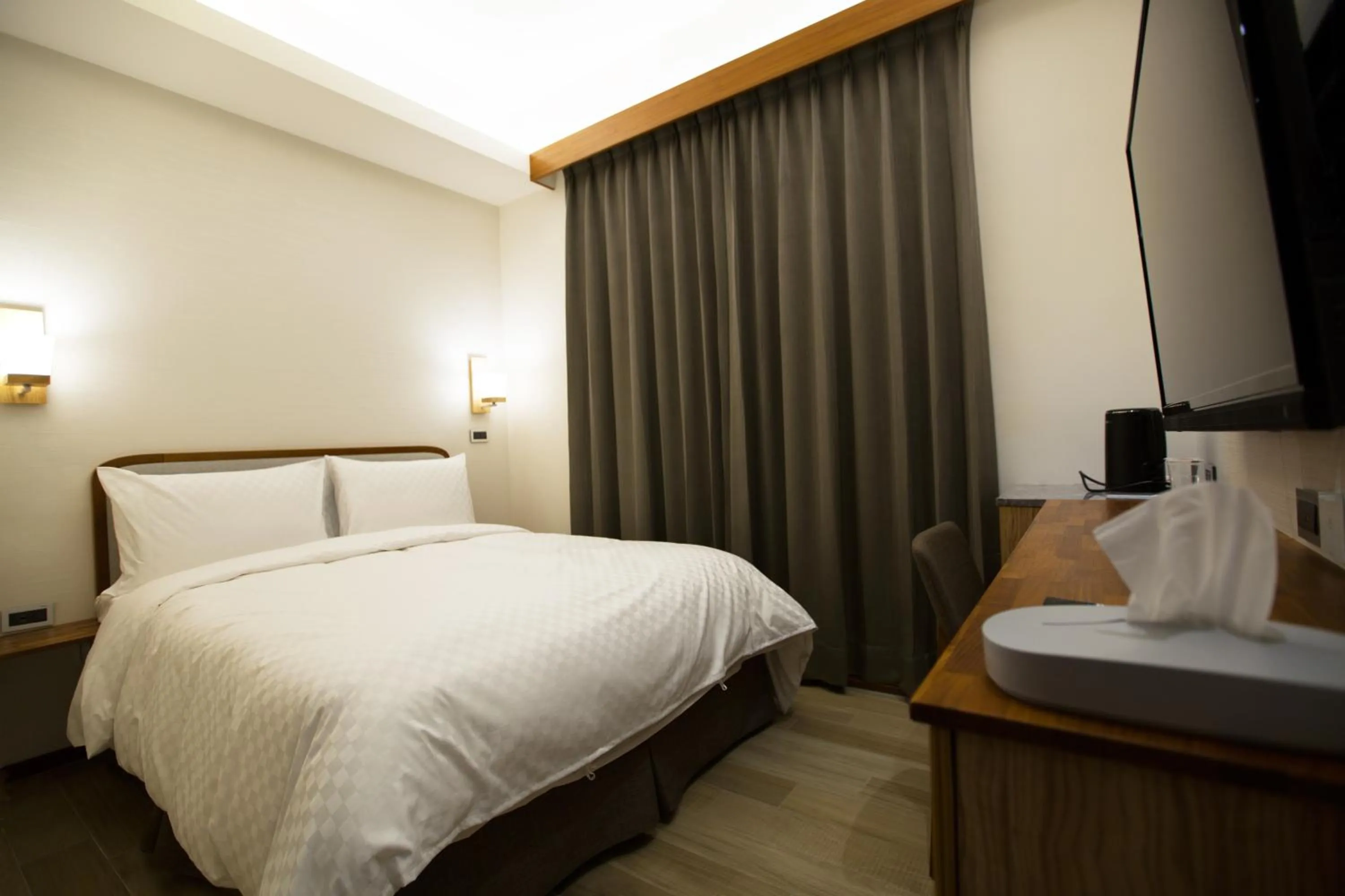 Bed in 原鄉商旅 Yuan Hsiang Hotel