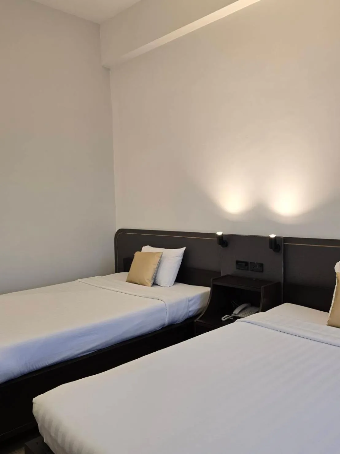 Bed in The Krungkasem Srikrung Hotel