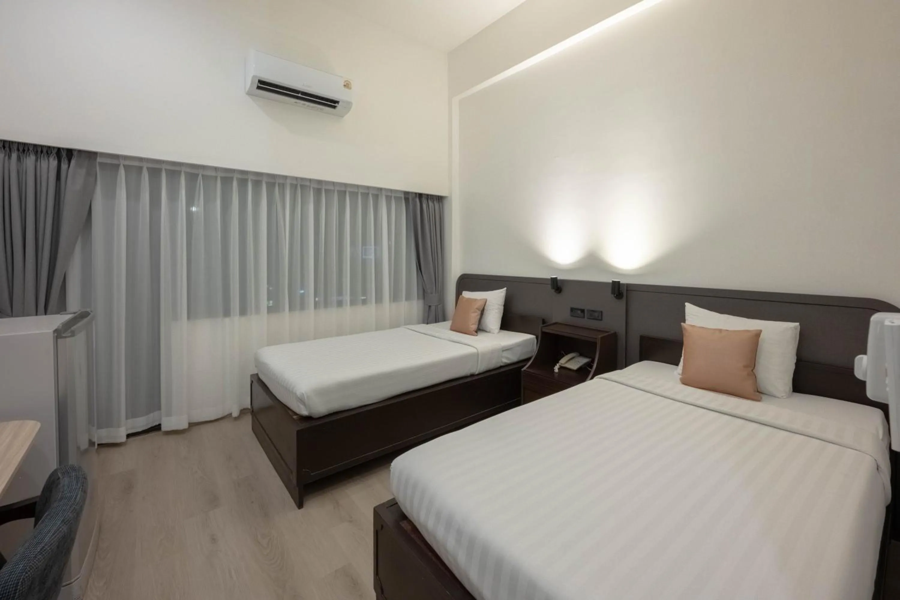 Bed in The Krungkasem Srikrung Hotel