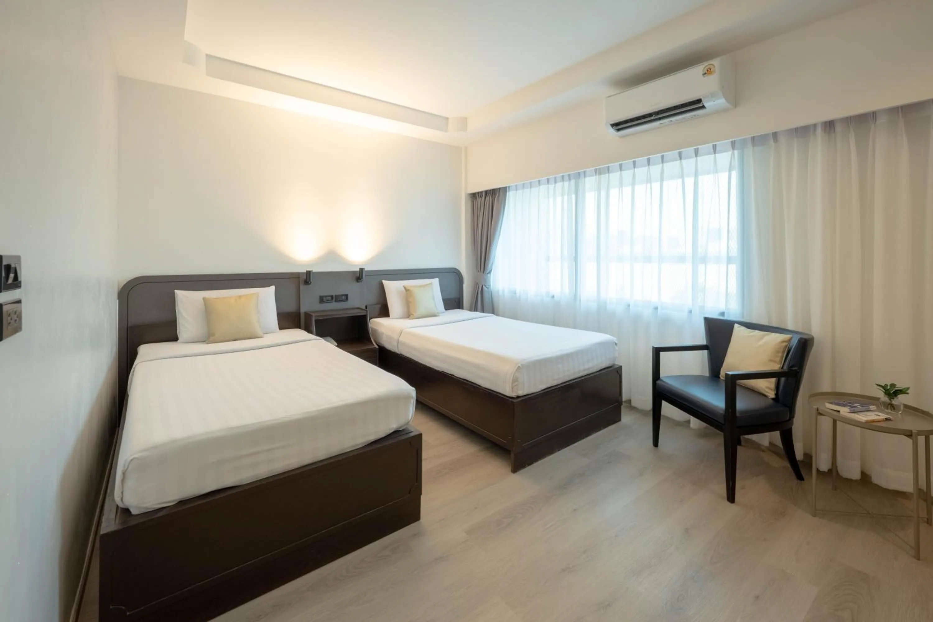 Bed in The Krungkasem Srikrung Hotel