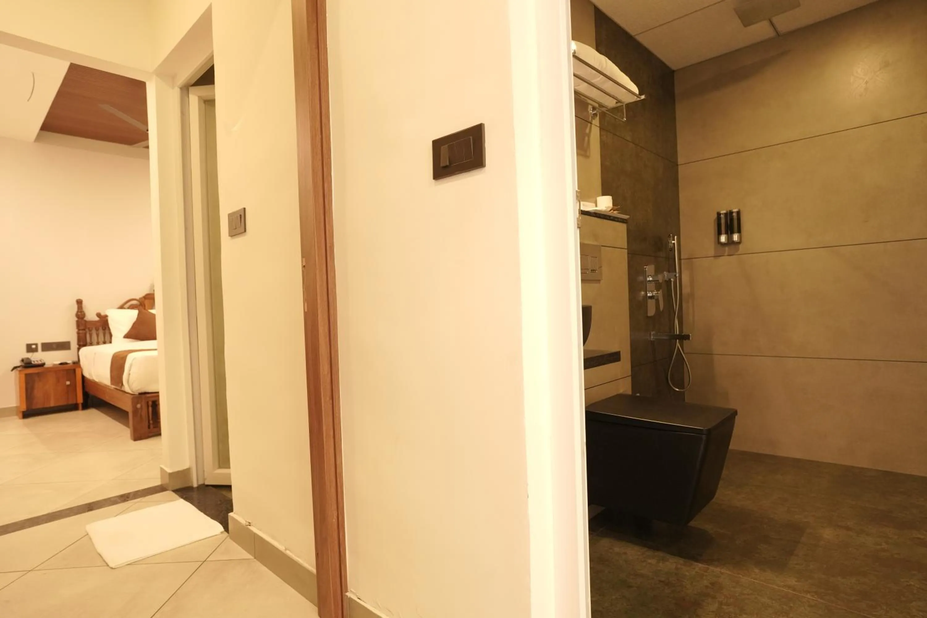 Bed in Aadisaktthi Leisure Resort, Kovalam