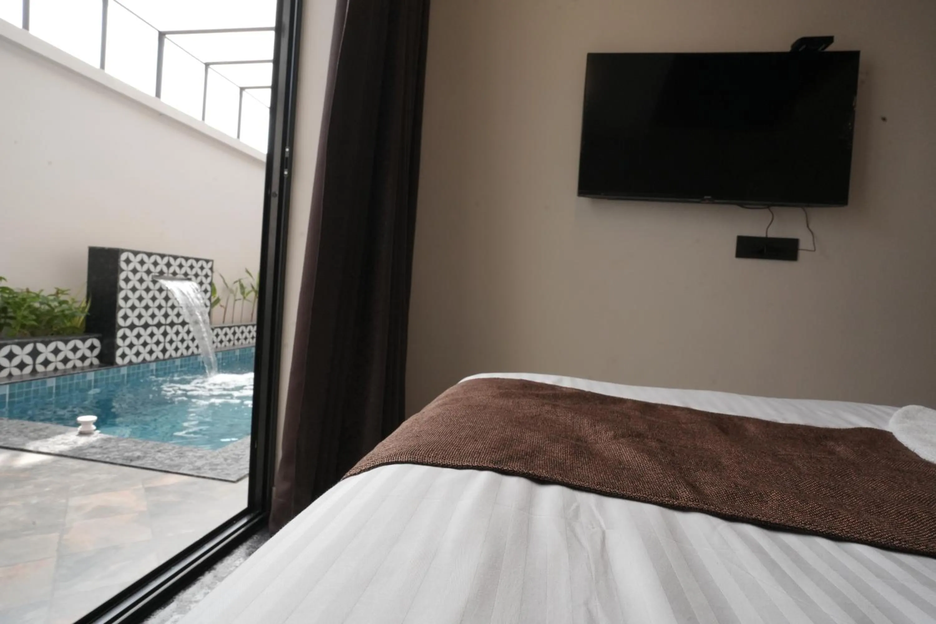 Bed in Aadisaktthi Leisure Resort, Kovalam