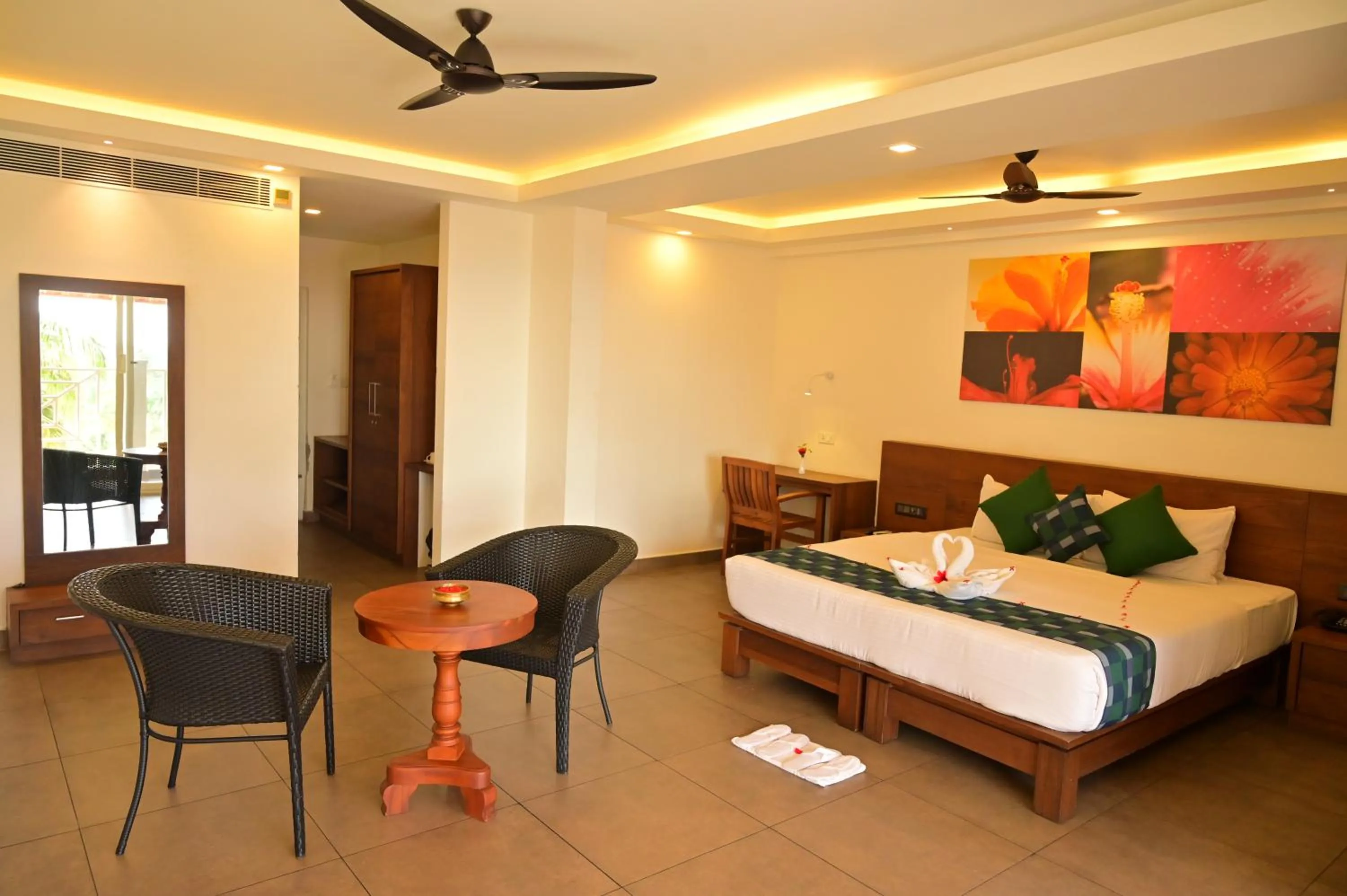 Bed in Aadisaktthi Leisure Resort, Kovalam