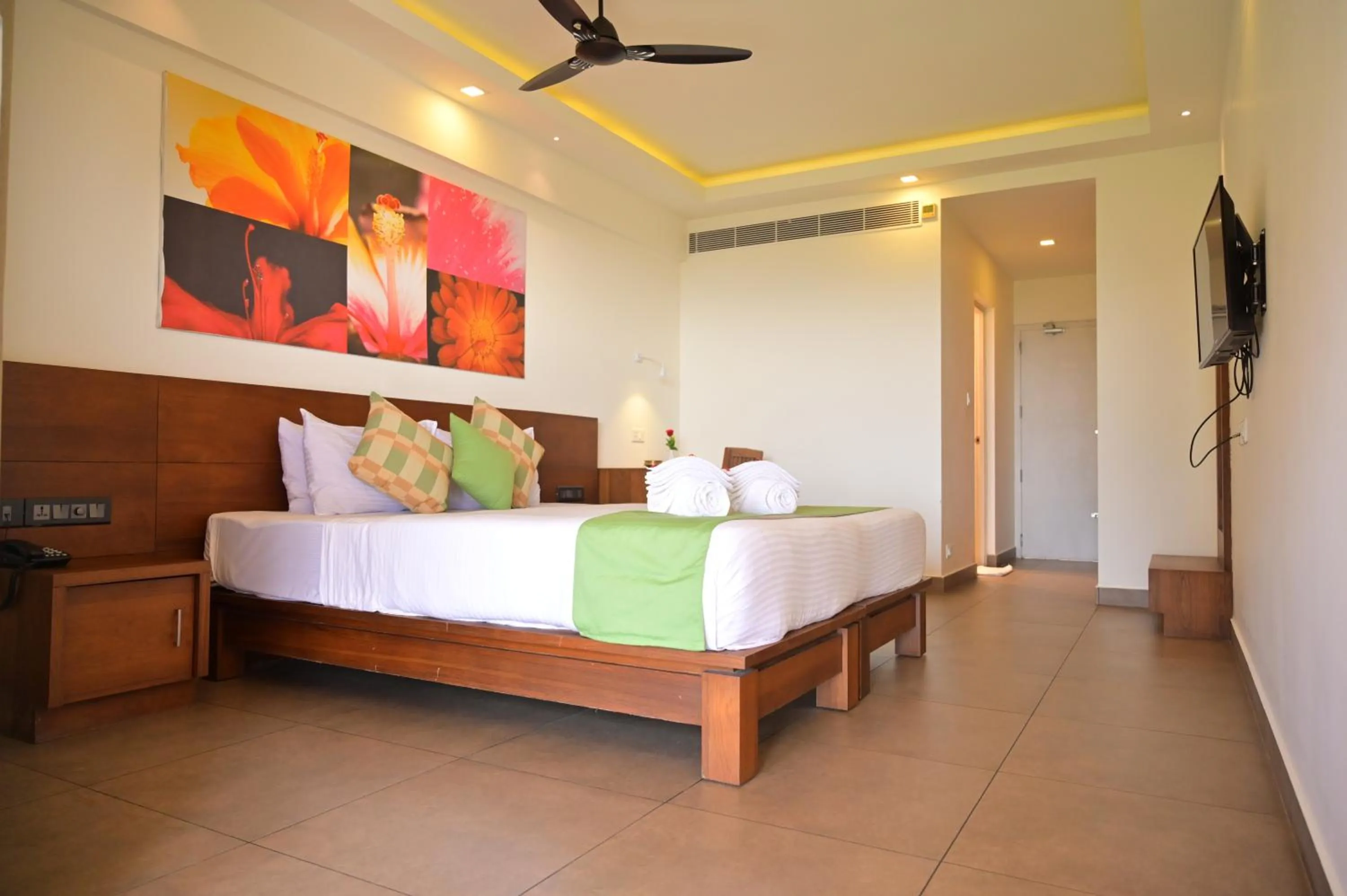 Bed in Aadisaktthi Leisure Resort, Kovalam