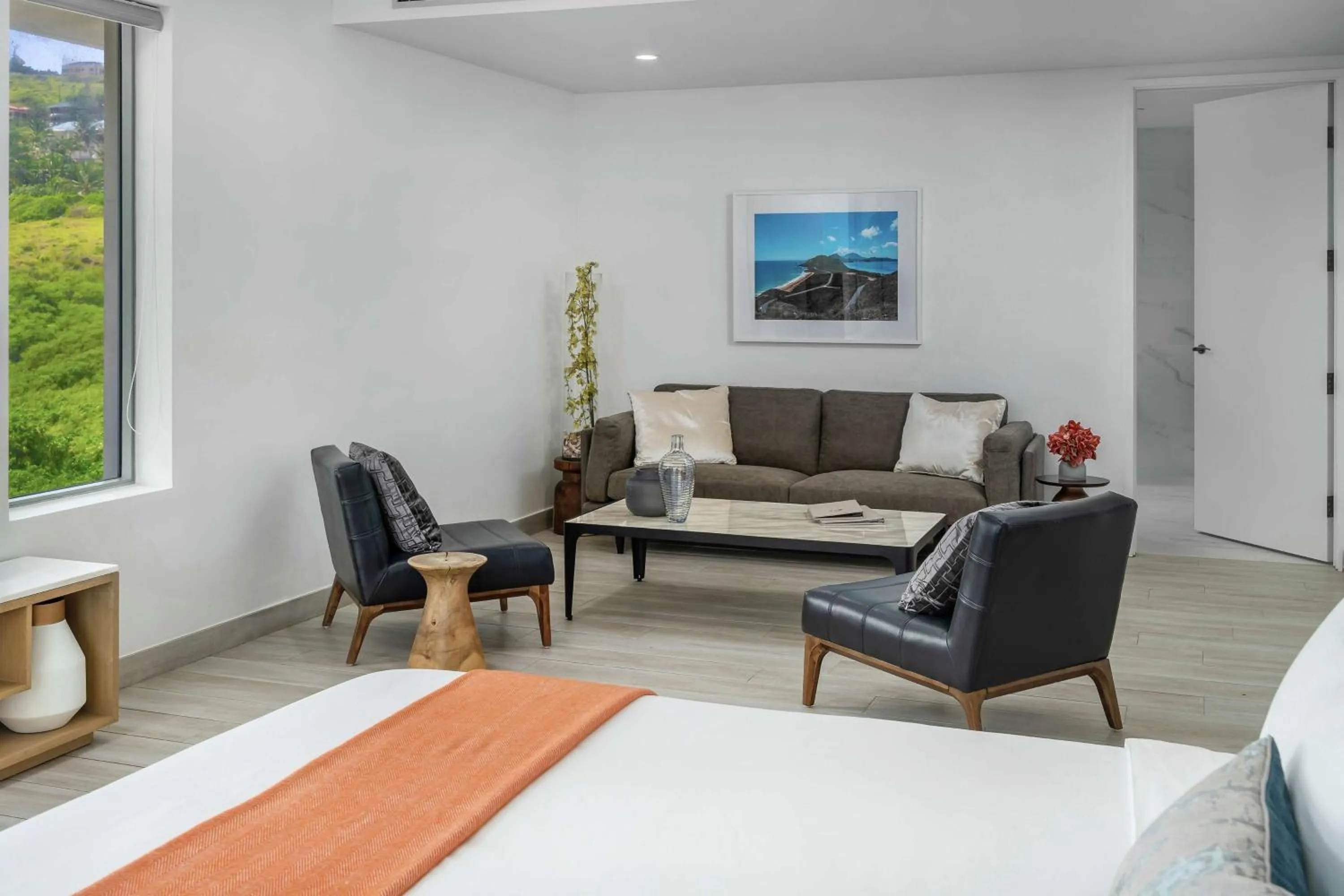 Living room in Koi Resort Saint Kitts, Curio Collection by Hilton