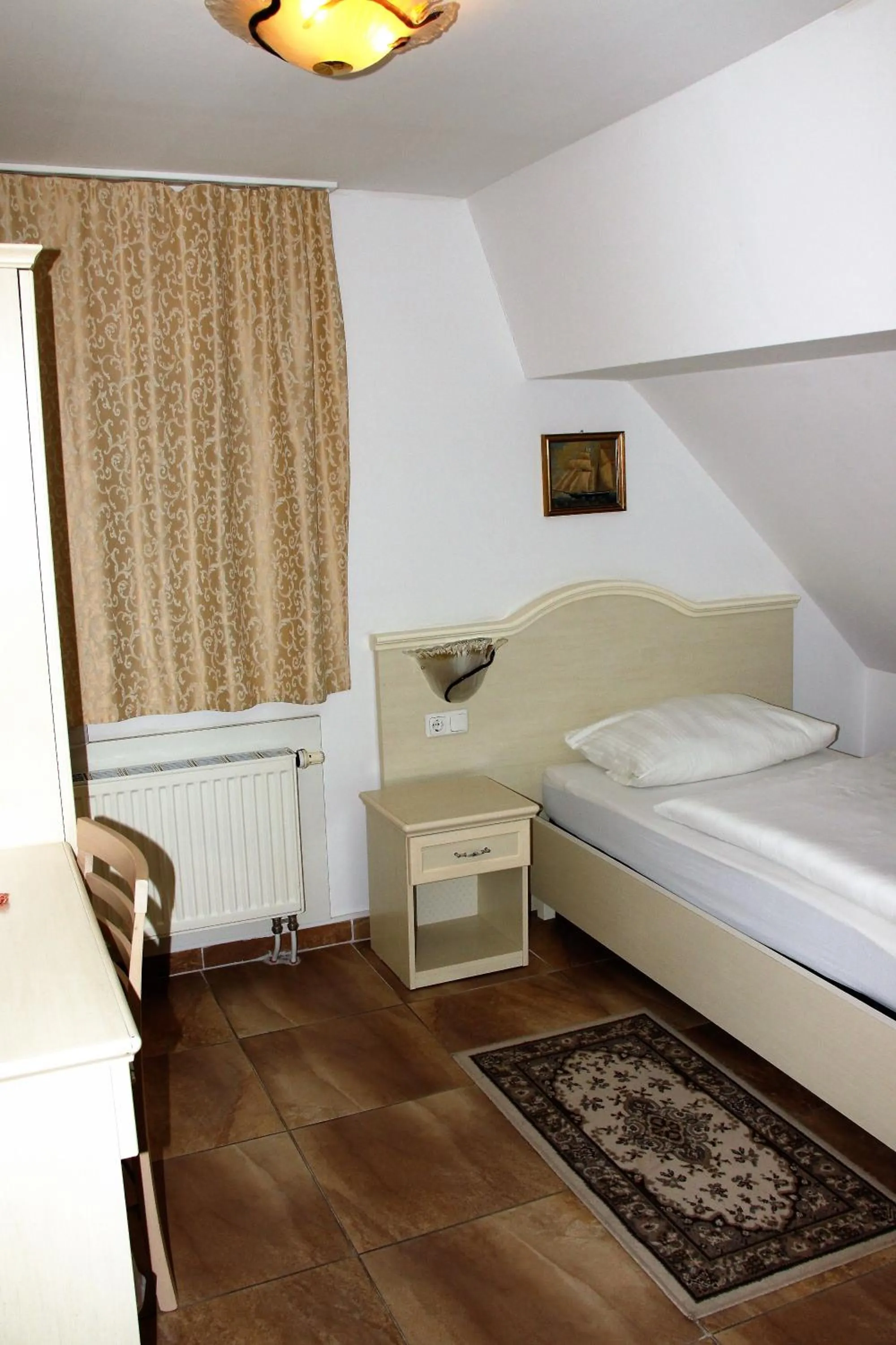 Bed in Hotel Villa Toscana