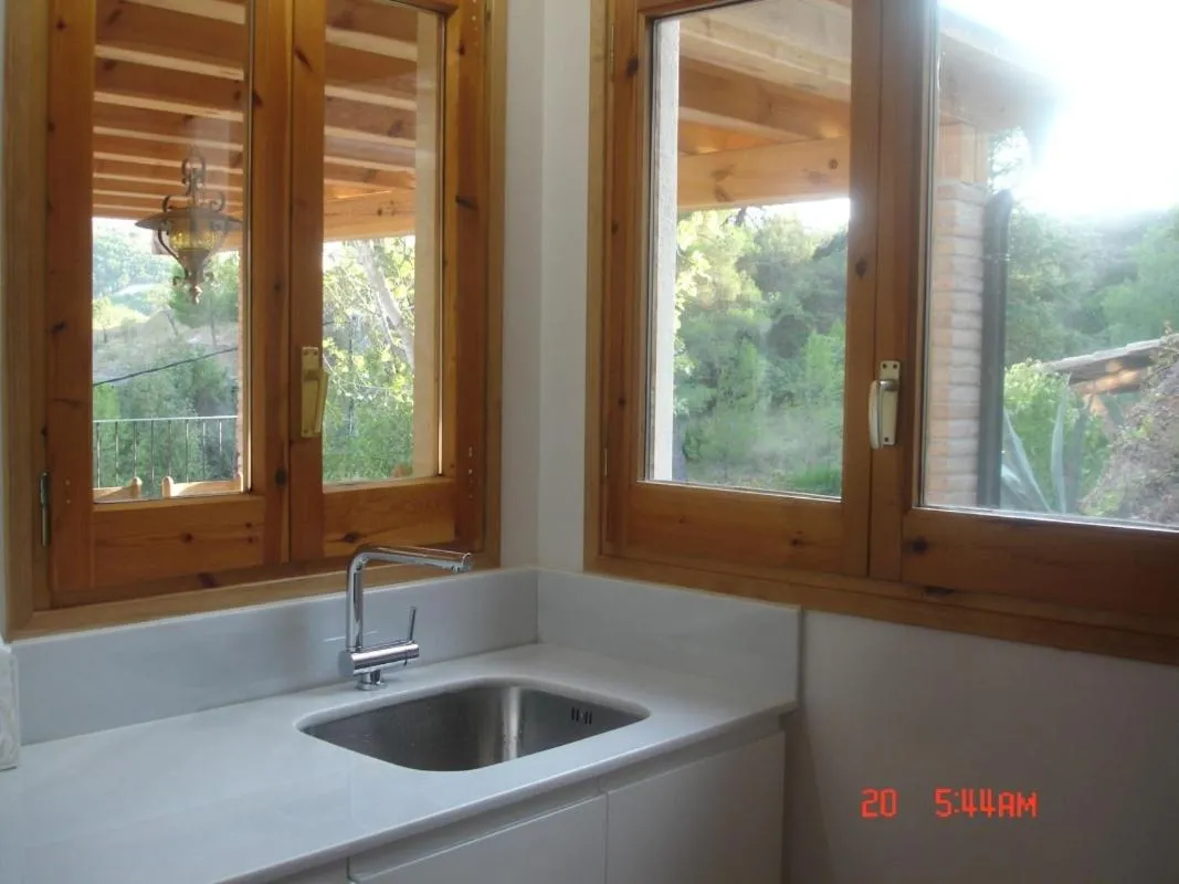 Kitchen or kitchenette in Ca l' Ermitanyo- Casa Torre Blanca