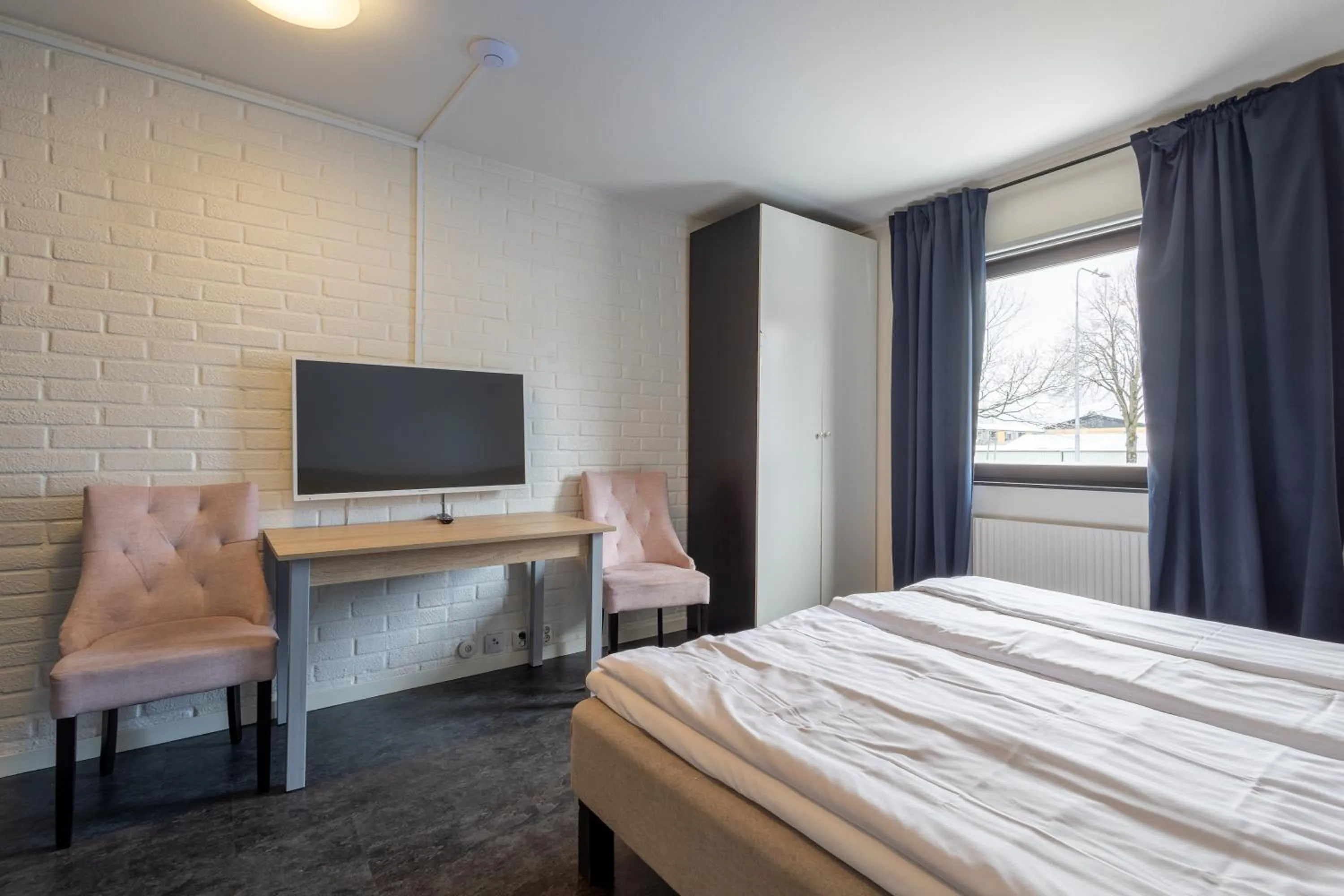 TV and multimedia, Bed in Halmstad Hotel Apartments