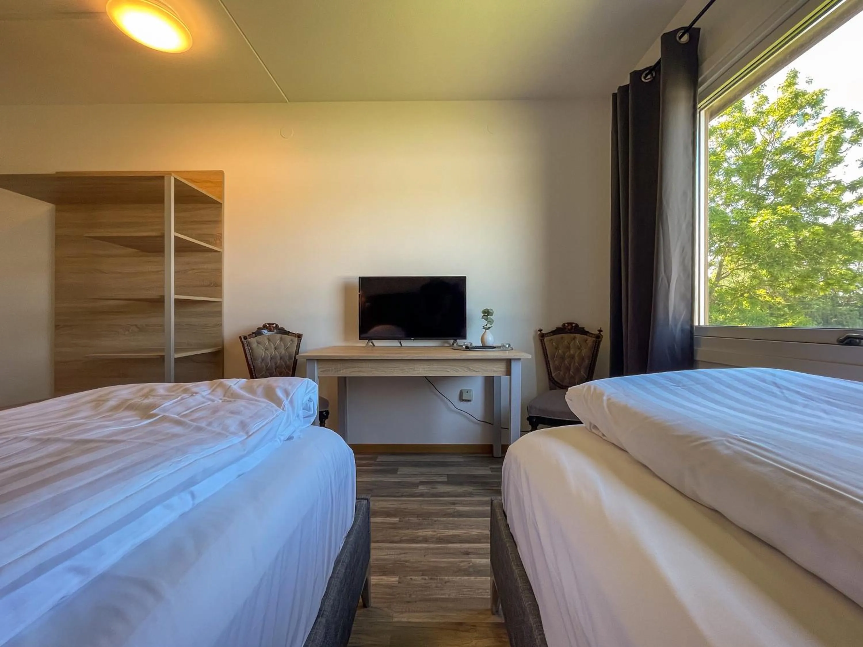 TV and multimedia, Bed in Halmstad Hotel Apartments