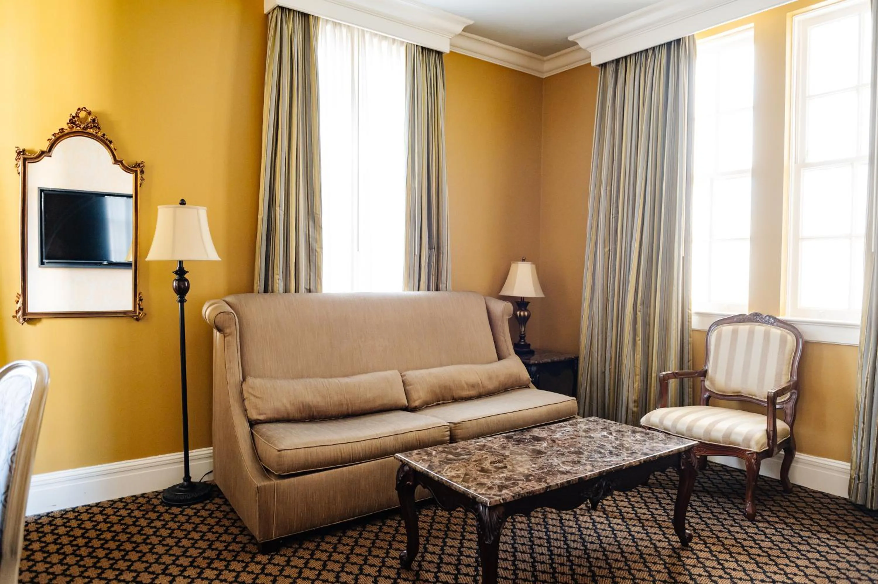 Living room in The Lafayette New Orleans By Kasa Living