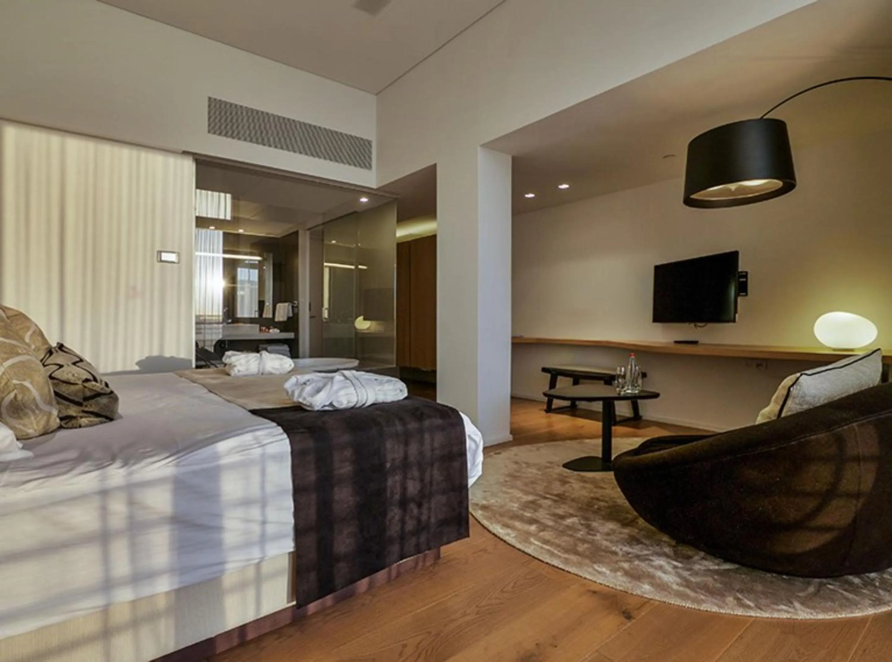 Living room, Bed in Cramim by Isrotel Exclusive