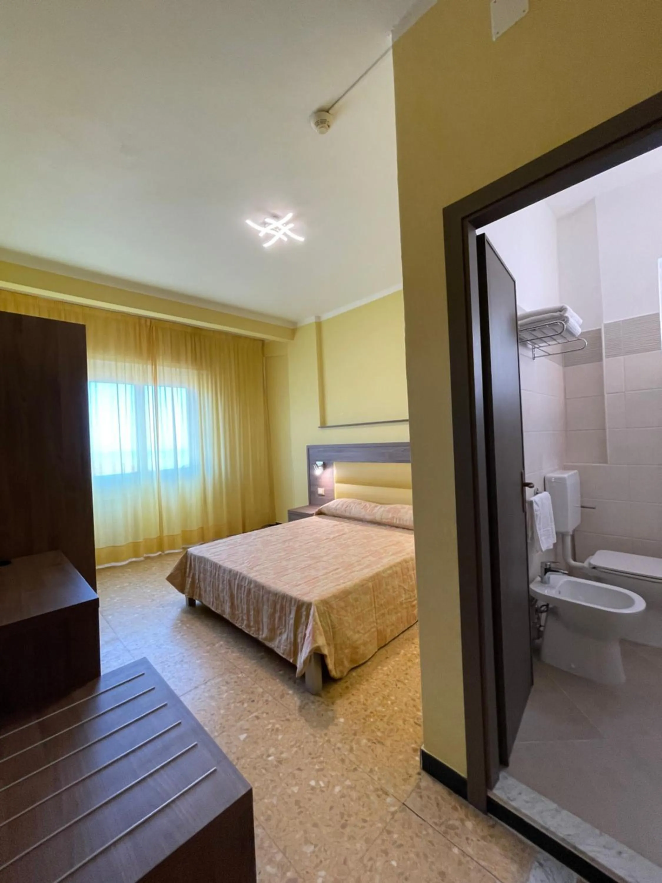 Bedroom in Hotel Robinia