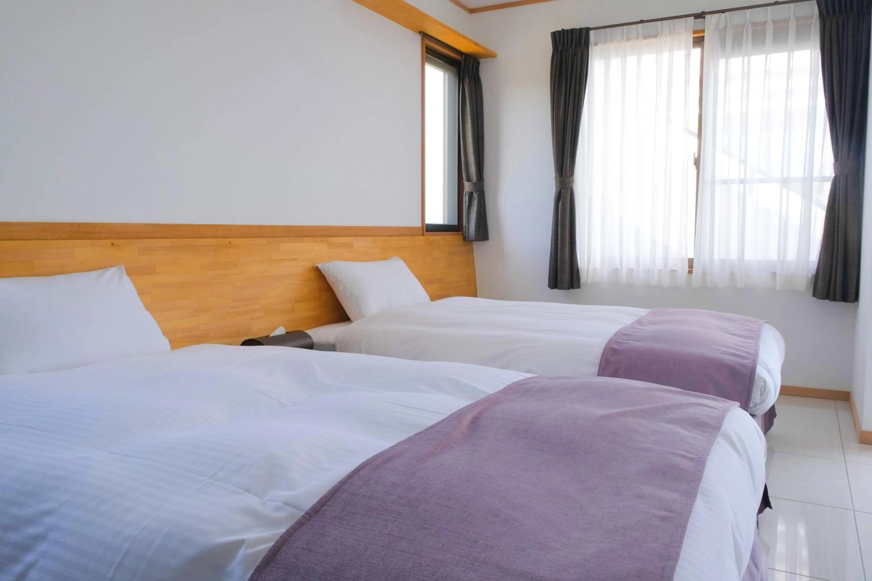 Bed in Blue Ocean Resort