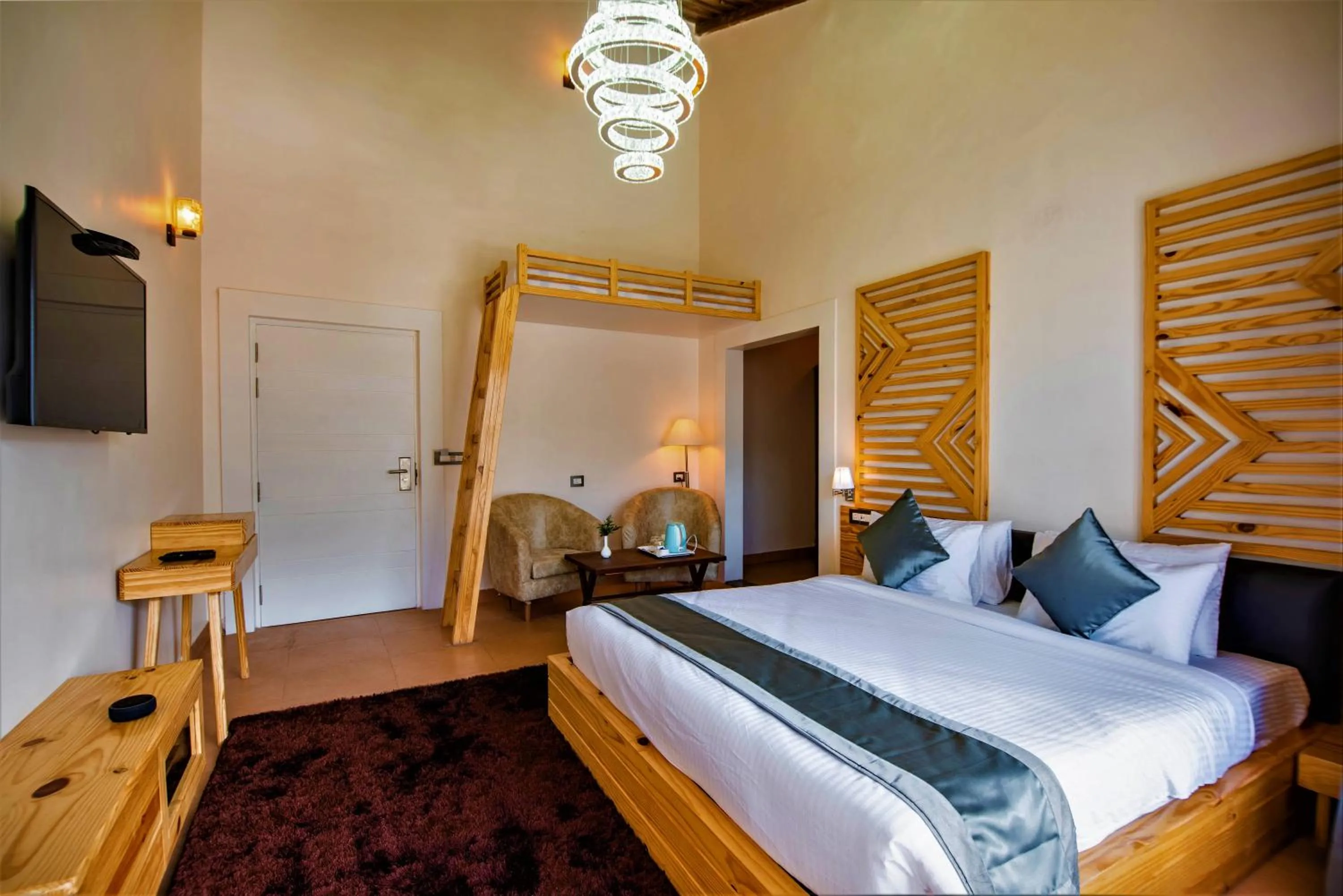 Bed in Clarks Exotica Resort Ramgarh Mukteshwar