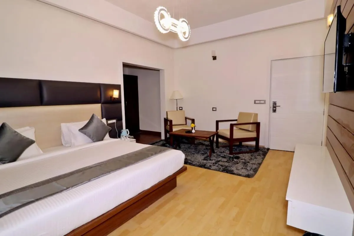 Bed in Clarks Exotica Resort Ramgarh Mukteshwar
