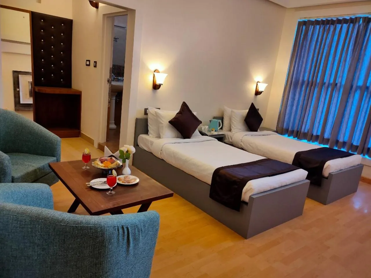 Bed in Clarks Exotica Resort Ramgarh Mukteshwar